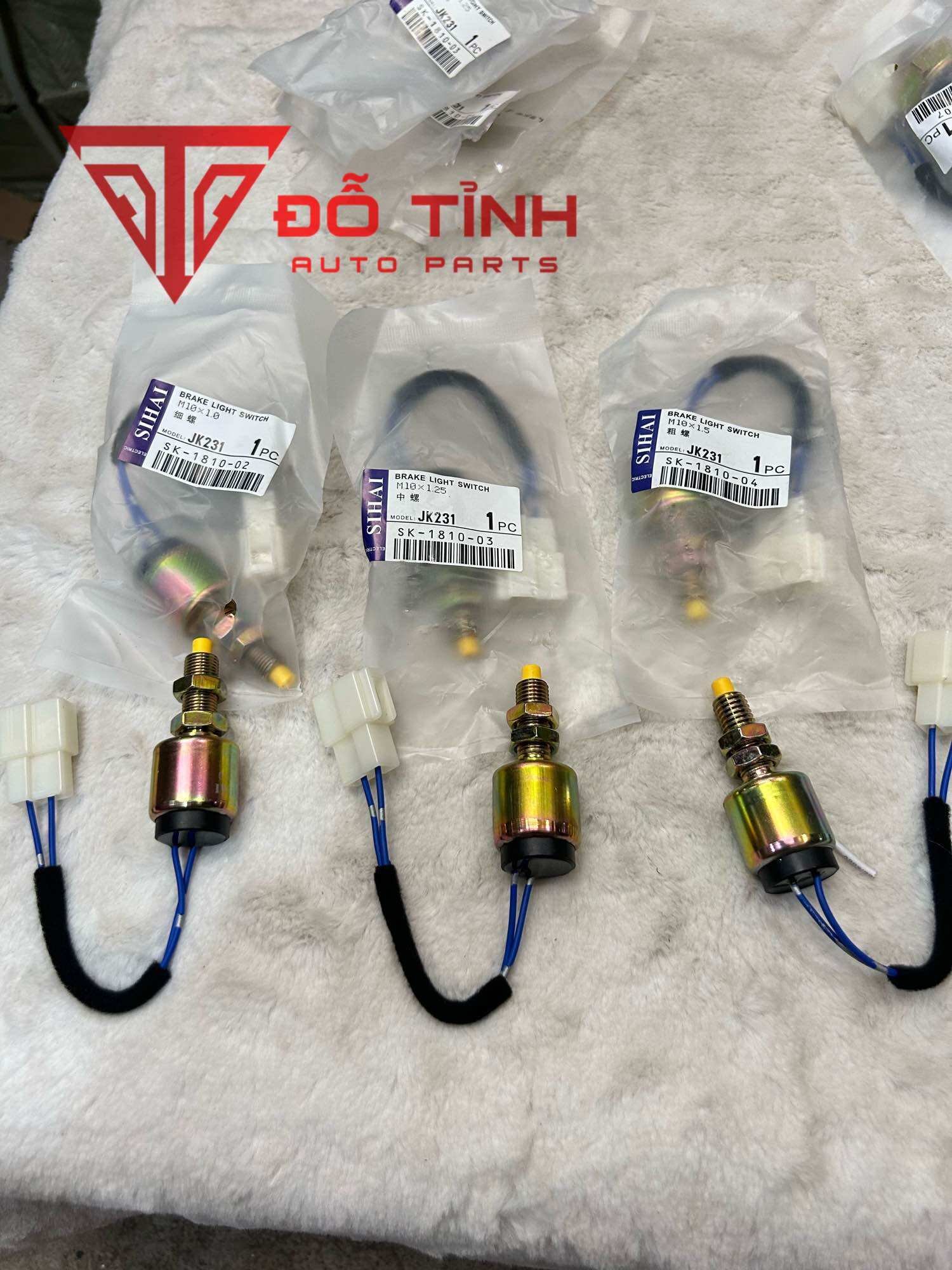 Núm báo phanh xe tải sihai . báo phanh jk231 ren 10mm