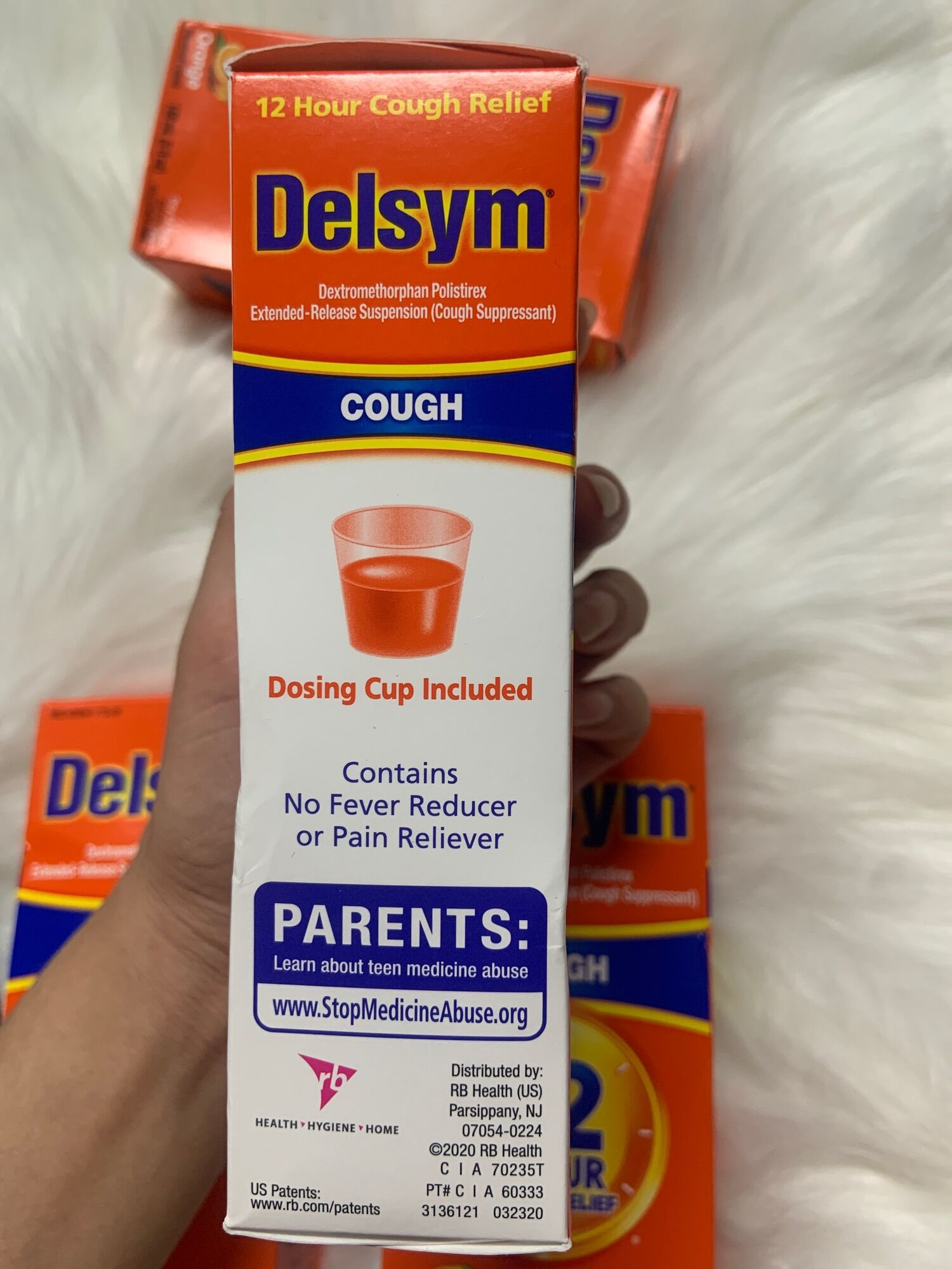 Siro h.o DELSYM 12HR 4+ 148ml (vị cam)