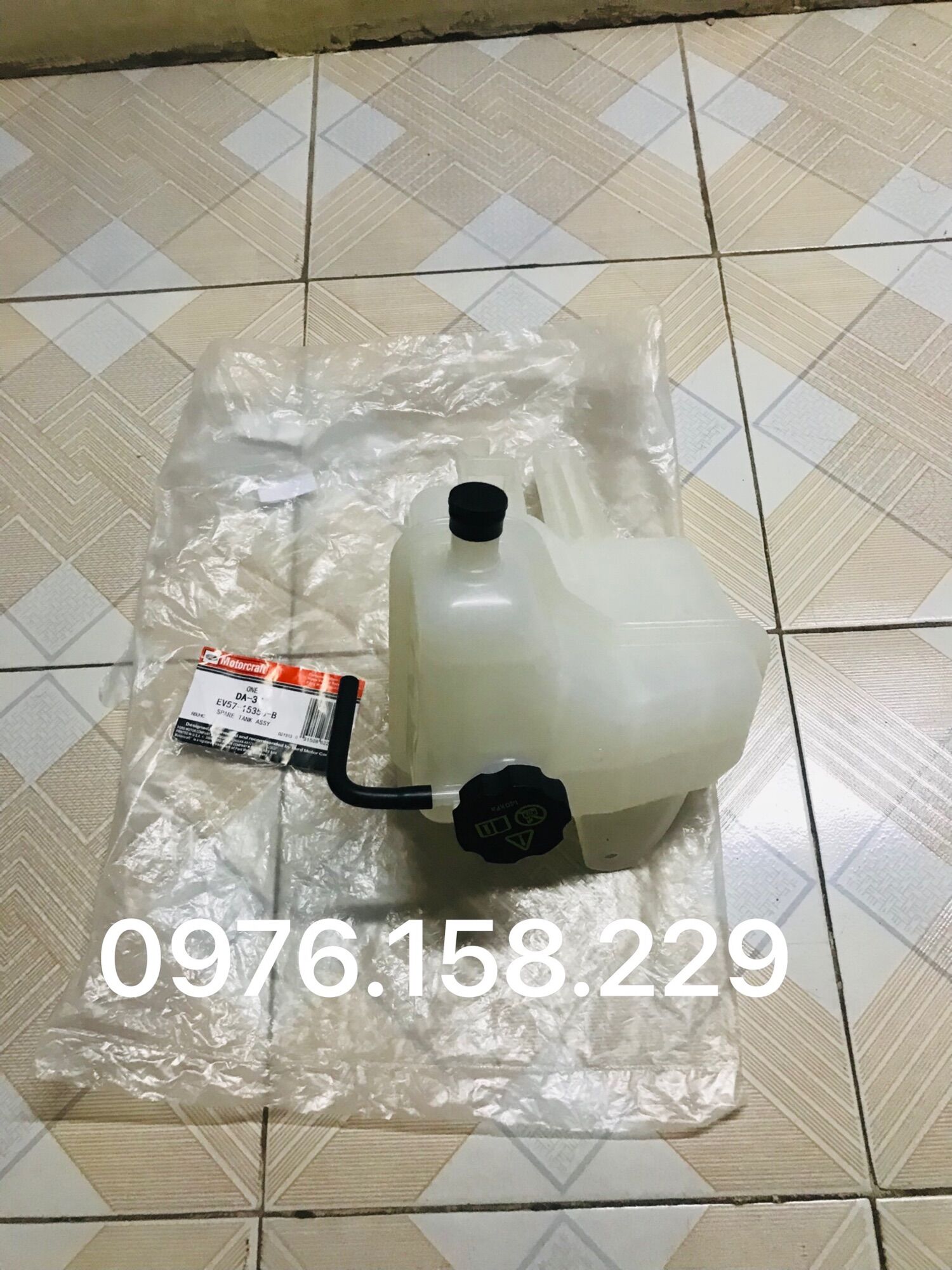 BÌNH NƯỚC PHỤ FORD ESCAPE