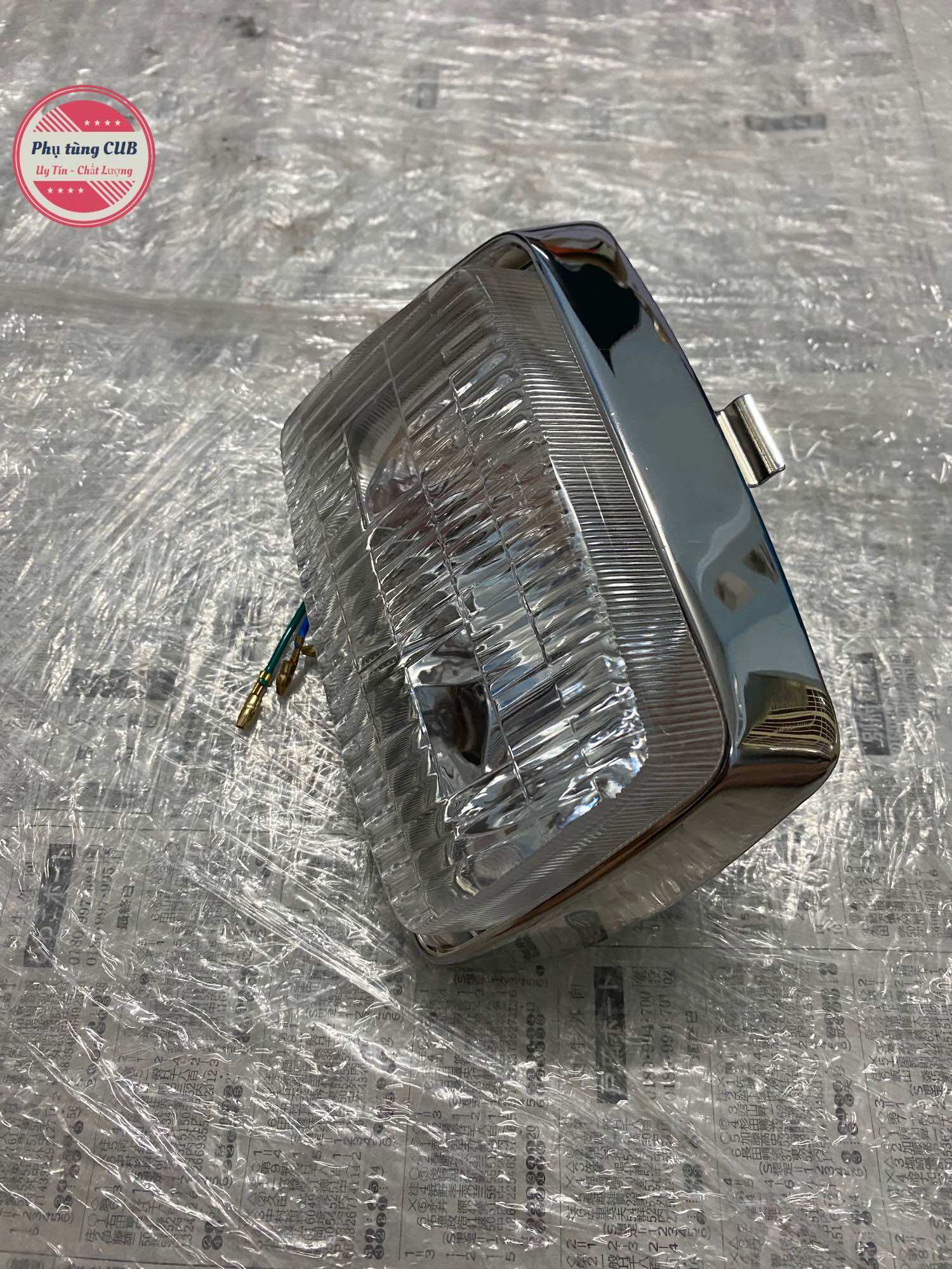Đèn pha xe cub 82-84-Dd giả zin