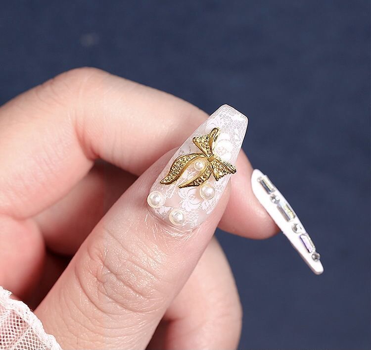 Charm nơ kim loại gắn móng tay ( giá 1 chiếc)