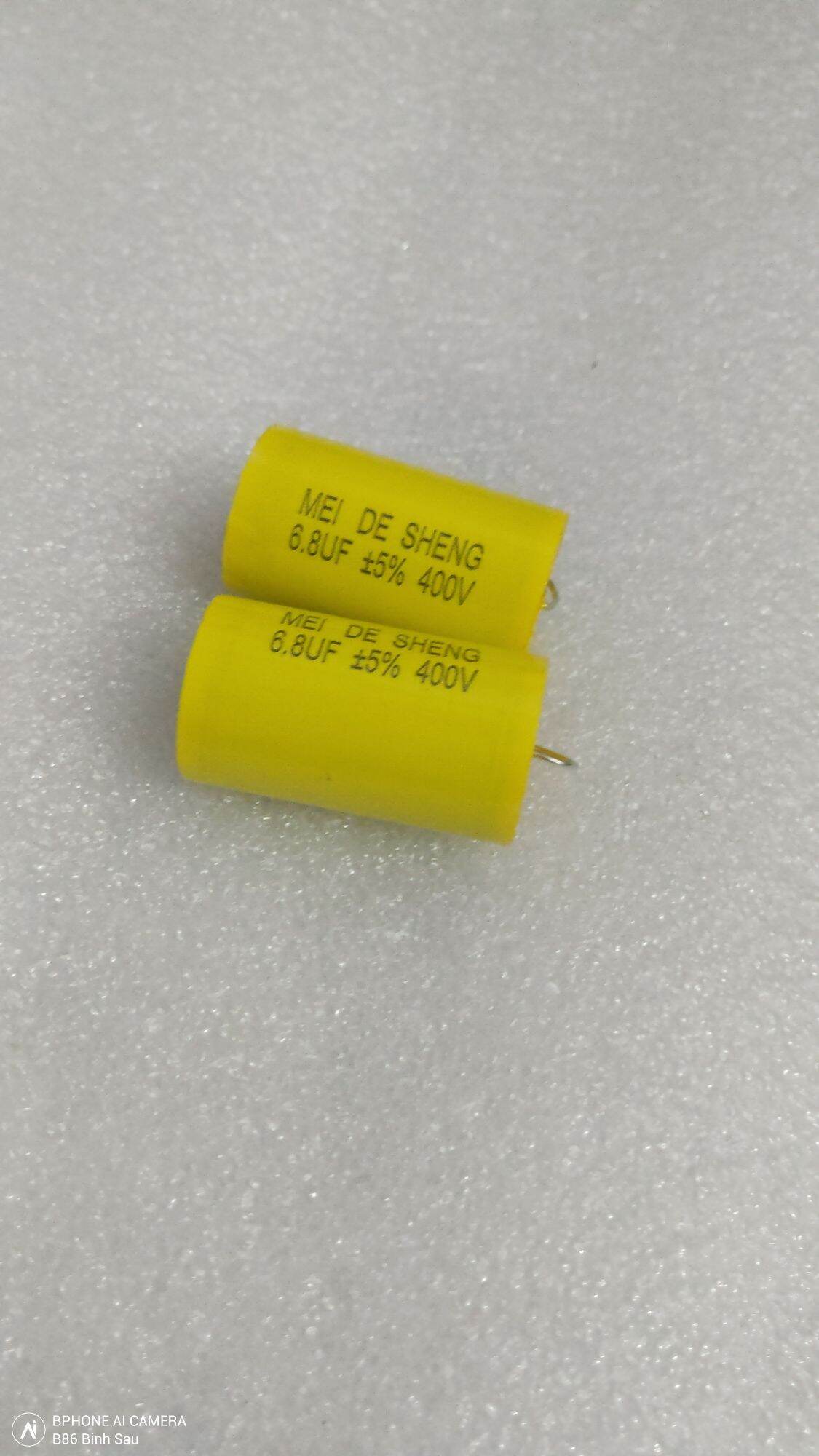 2 cái  tụ 6,8uf 400v