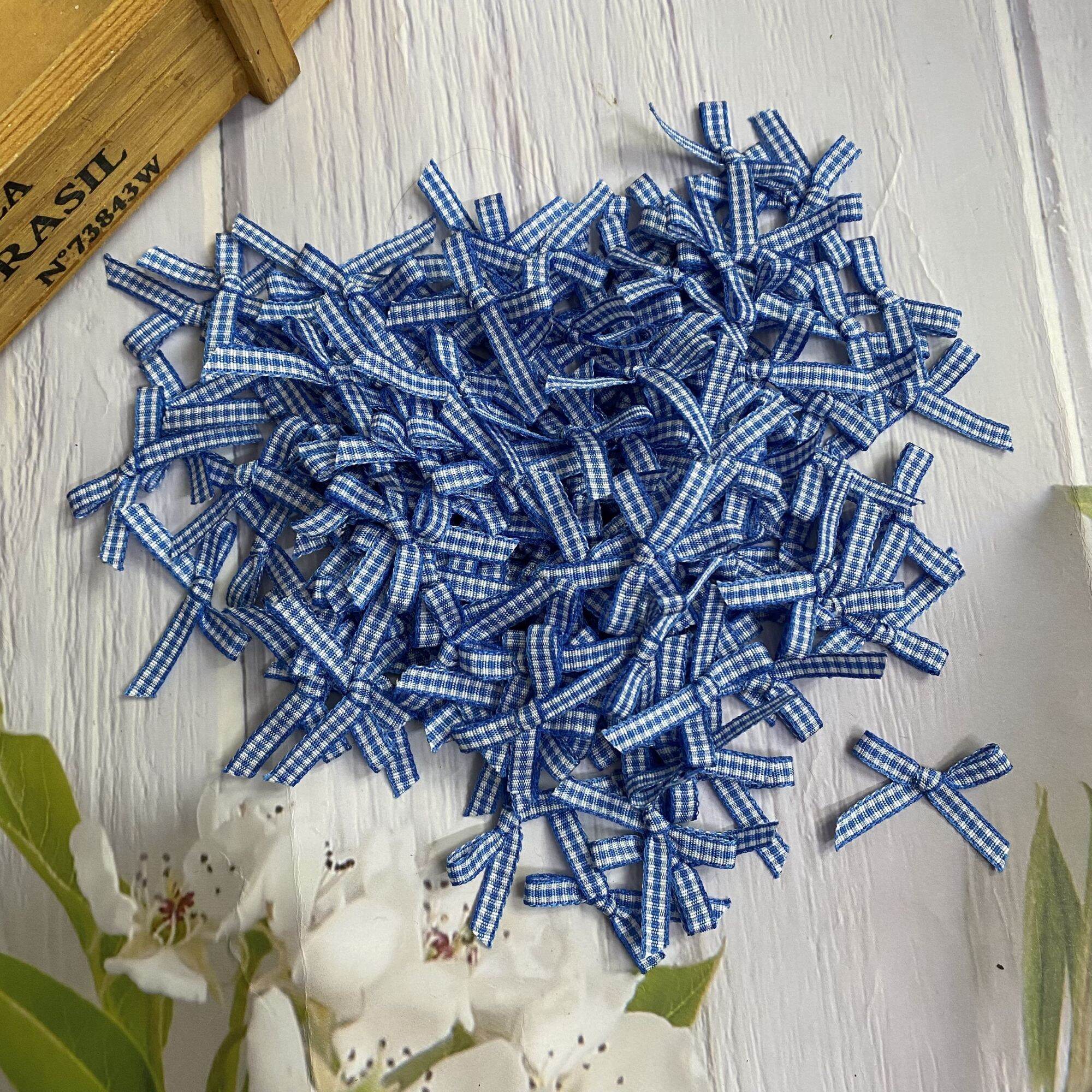 Nơ trang trí thủ công, bản rộng 5mm ×ngang khoảng 3cm.