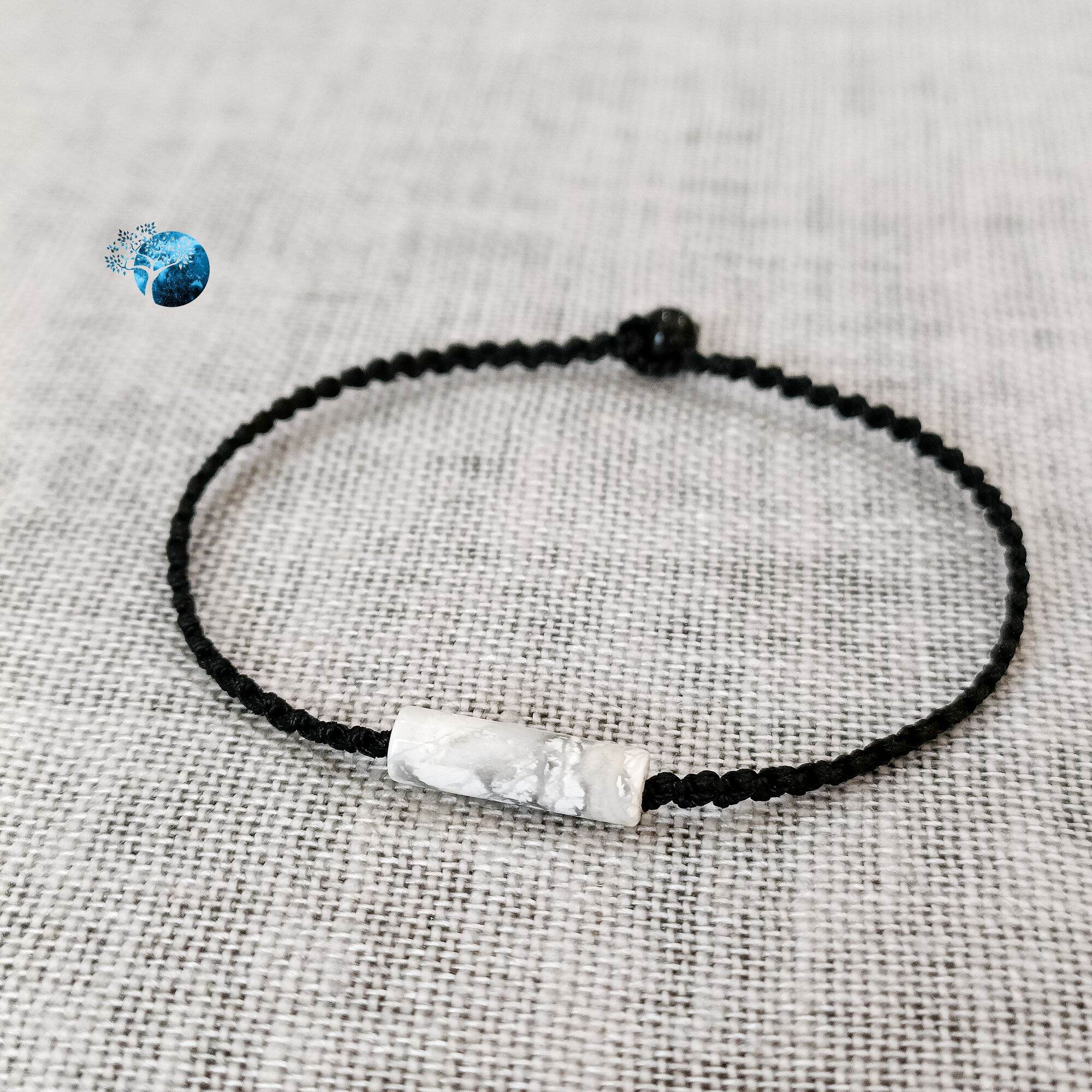 Vòng tay tết dây lu thống đá howlite (đá bạch tùng)
