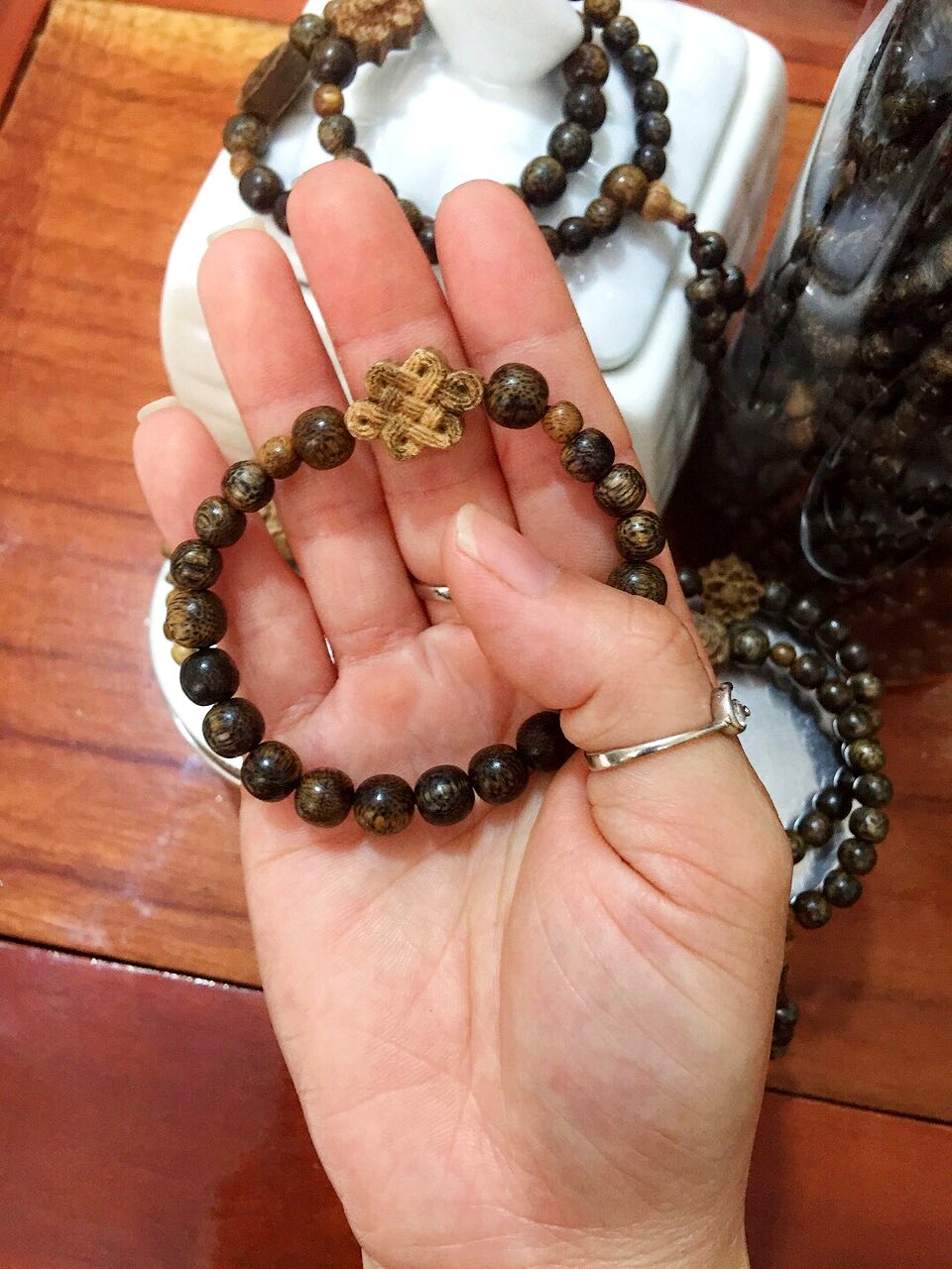Vòng tay trầm hương tóc mix charm