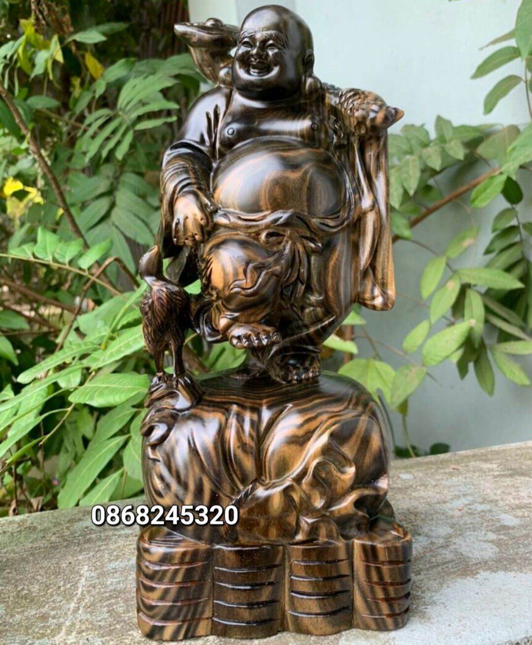 Tượng phật di lặc dắt cò bằng gỗ mun hoa đẹp long lanh kt cao 30×13×12cm