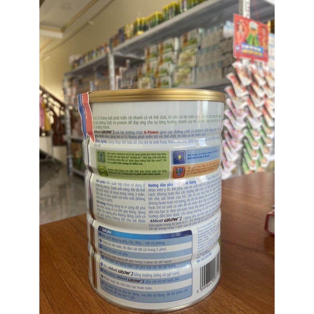 Sữa bột Abbott Grow 2/3 . Lon:900gr. Abbott Hoa kì