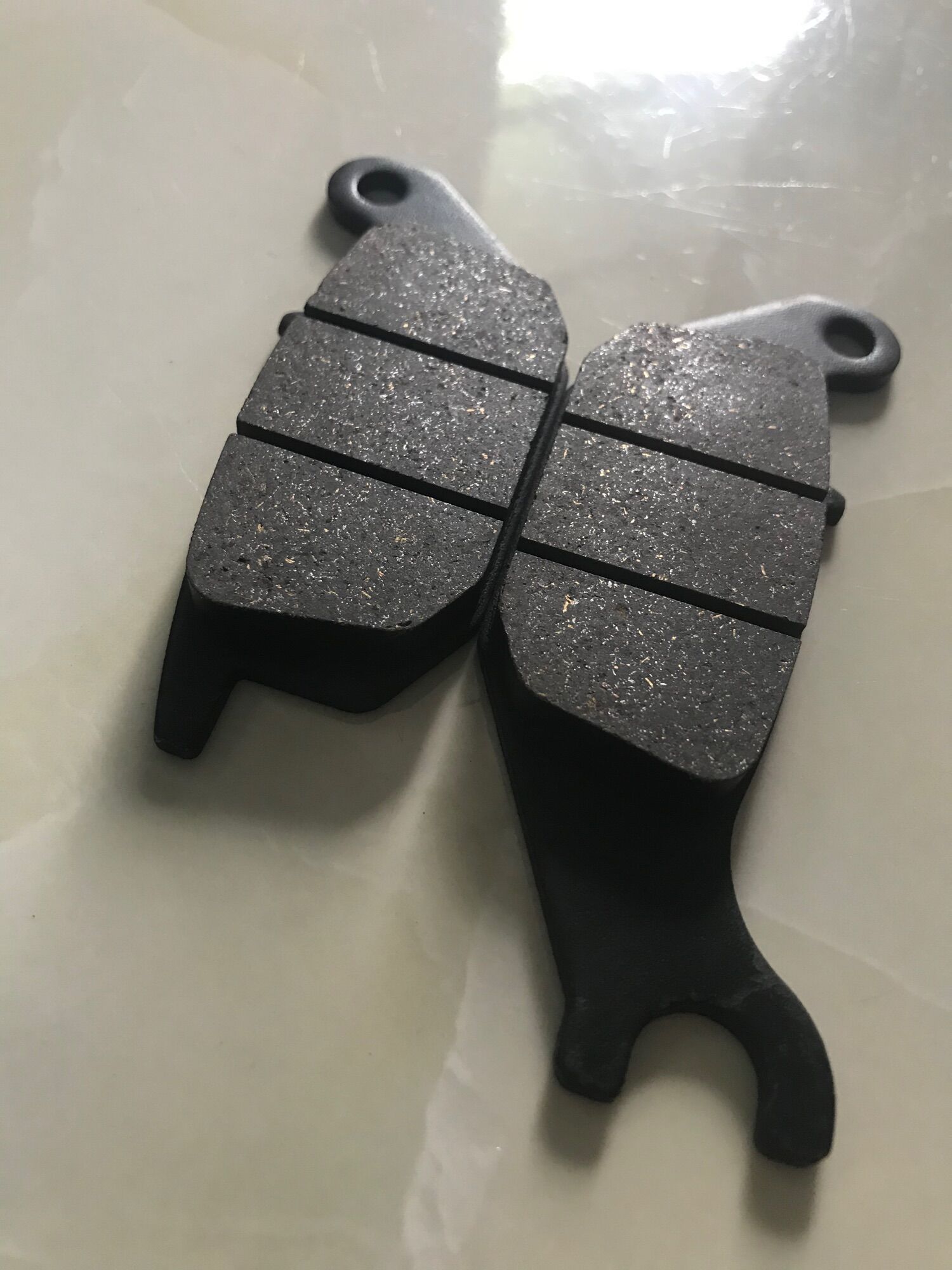 Má phanh dầu( bố thắng đĩa) exciter 135 sau