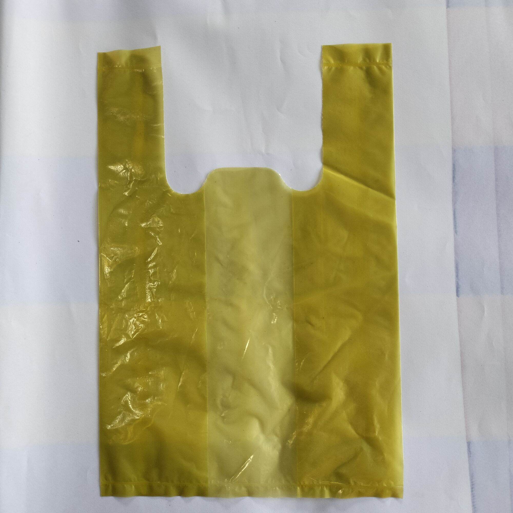 Túi xốp nilon màu mỡ có quai (1kg)