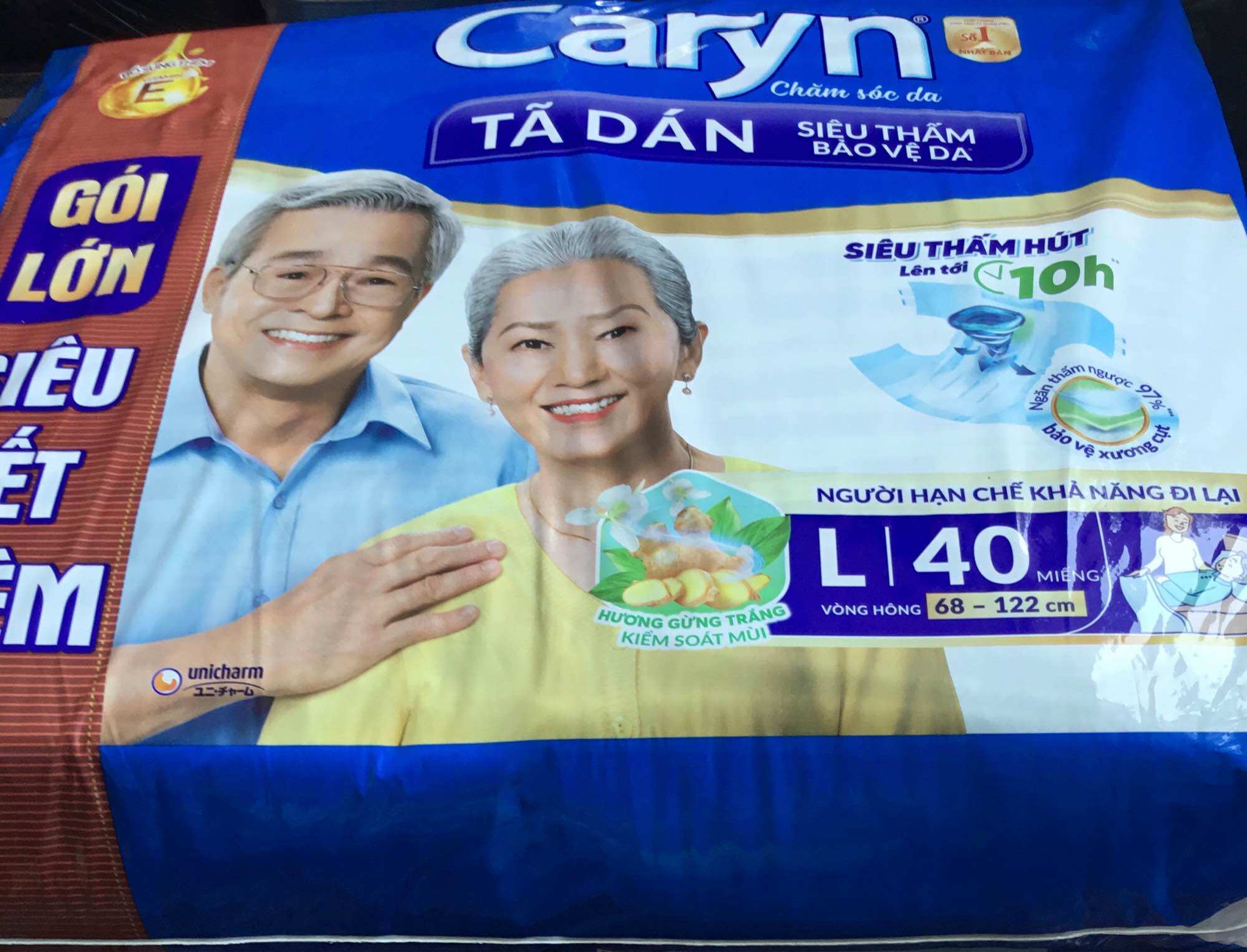Tã dán Caryn L40 (L40 là mẫu mới của ML40) Siêu thấm Đệm thấm xanh bảo vệ vùng xương cụt - Date luôn mới