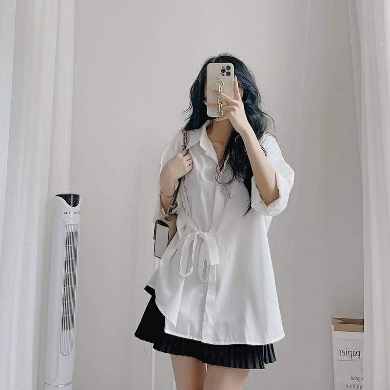 Sơ mi buộc lệch eo