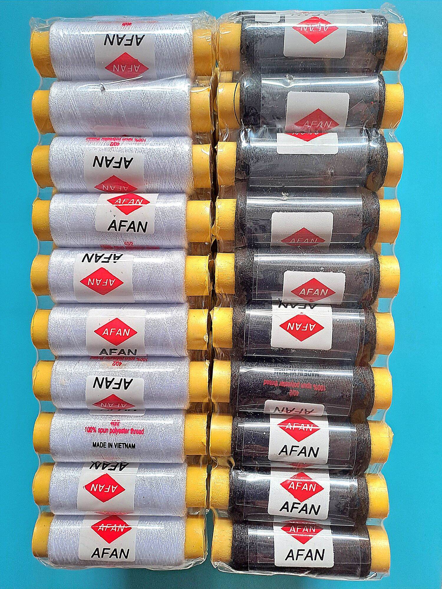 Lốc 10 ống chỉ may đen , trắng & nhiều màu