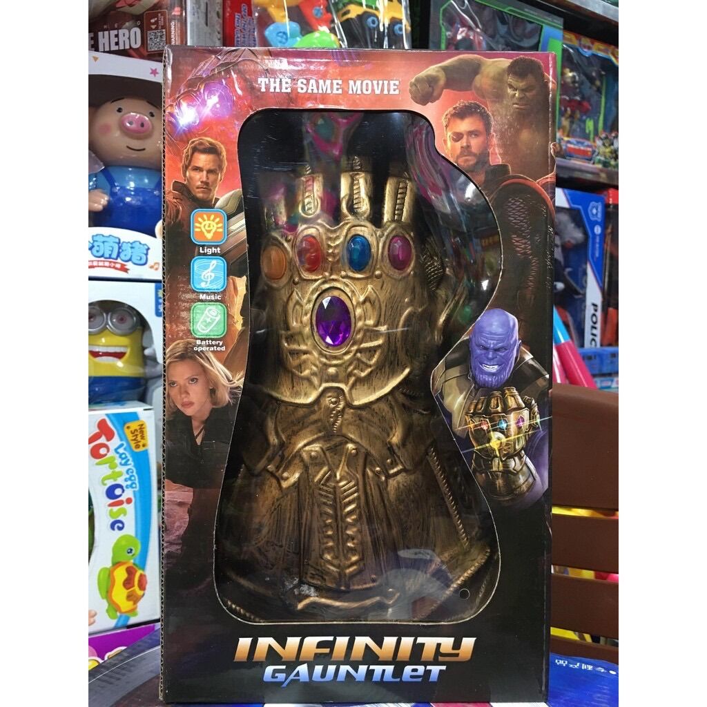Đồ Chơi Siêu Nhân Găng Tay Thanos Có Đèn Và Nhạc ZR999 Chất Liệu Cao Su Mềm