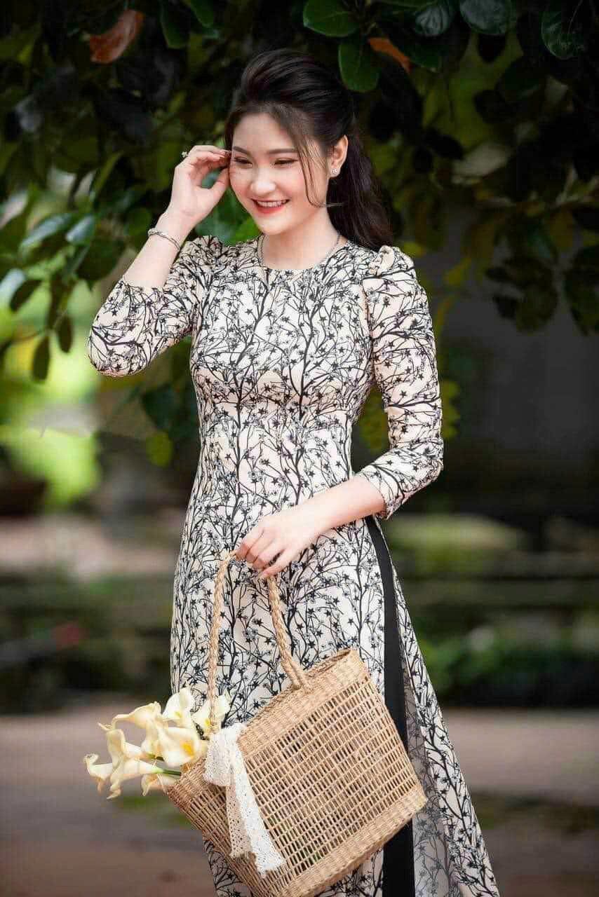 Áo dài lụa nhật nhí đen tay phồng giá rẻ