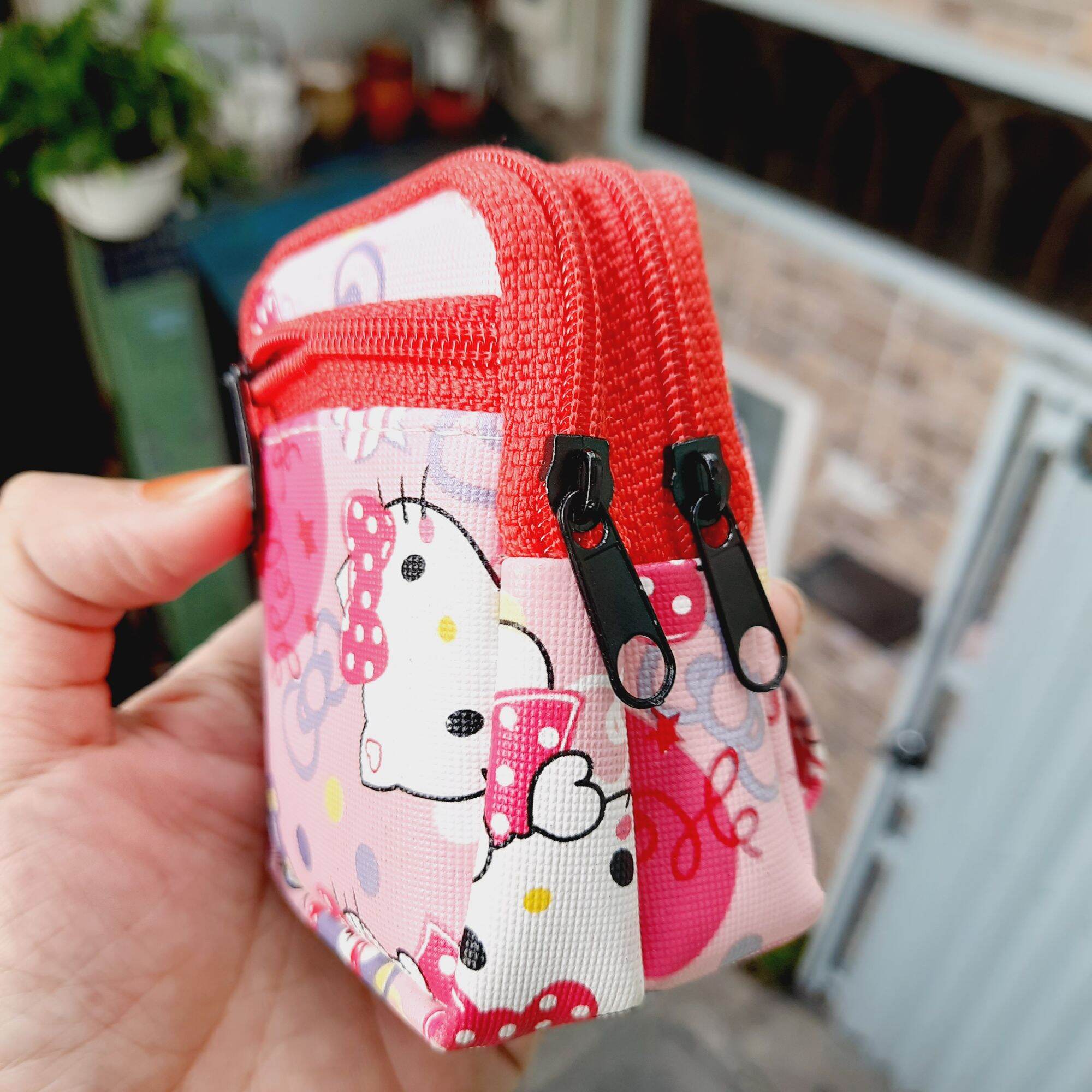 Móc khóa balô hình kitty có 3 ngăn đựng ( 8×7cm)