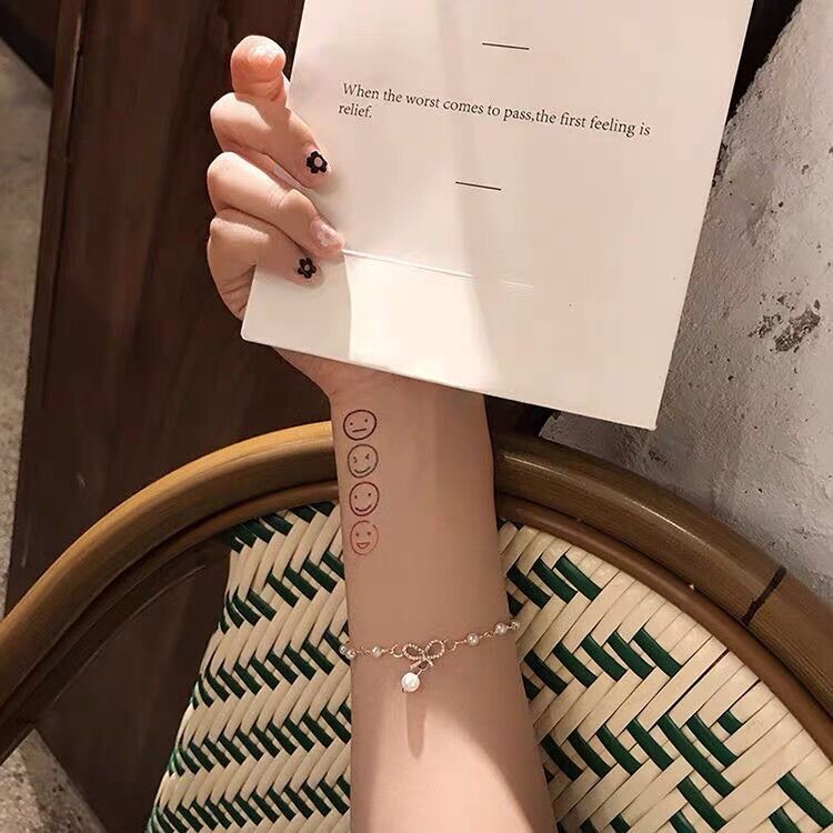 Vòng tay chuỗi ngọc đính nơ tiểu thư