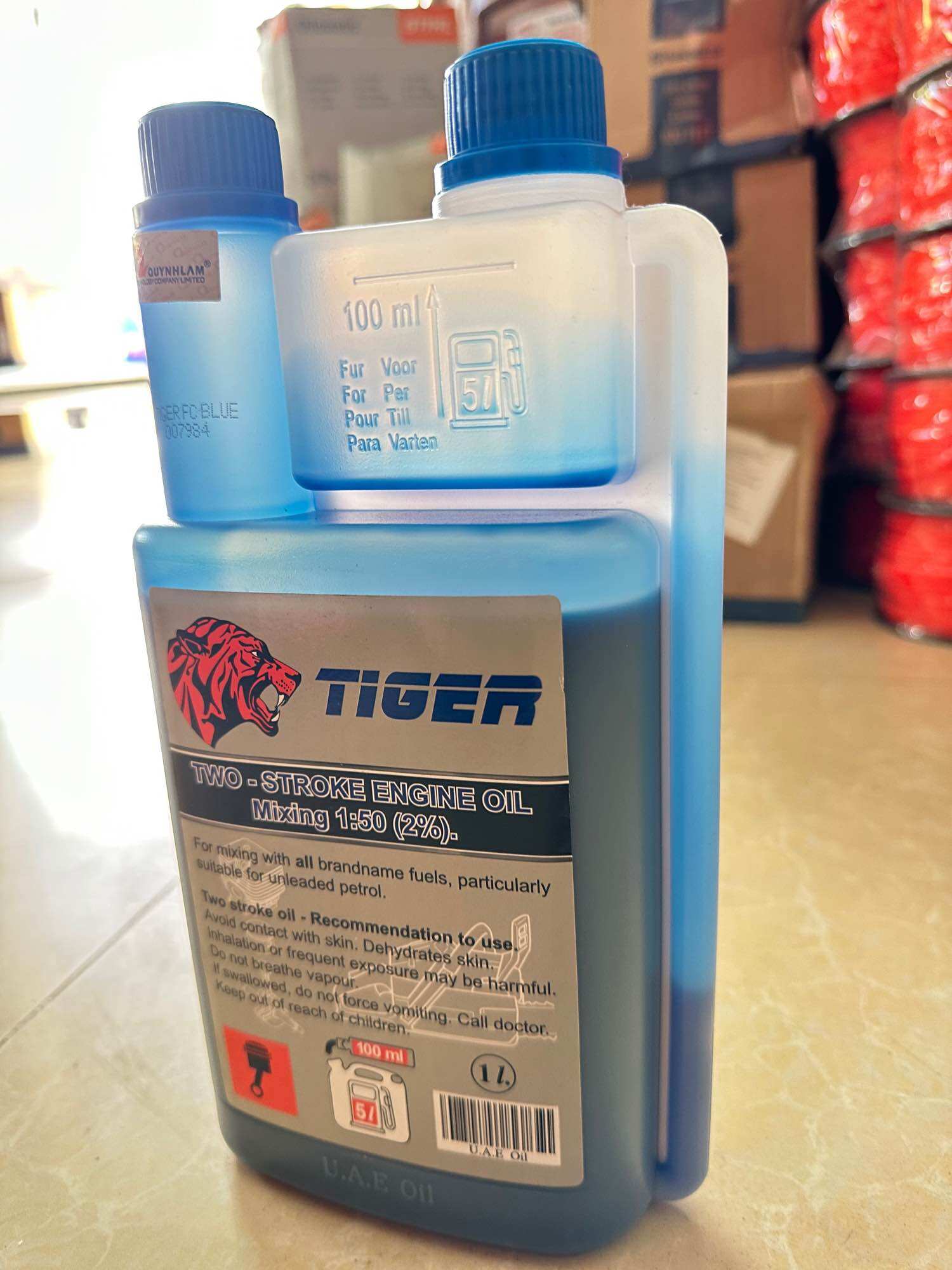 Dầu ( nhớt ) 2 thì Tiger xanh