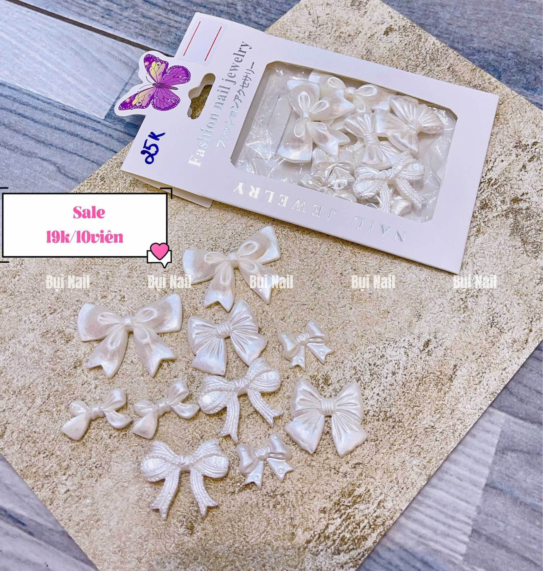 Sale charm nơ to trắng set 10 viên
