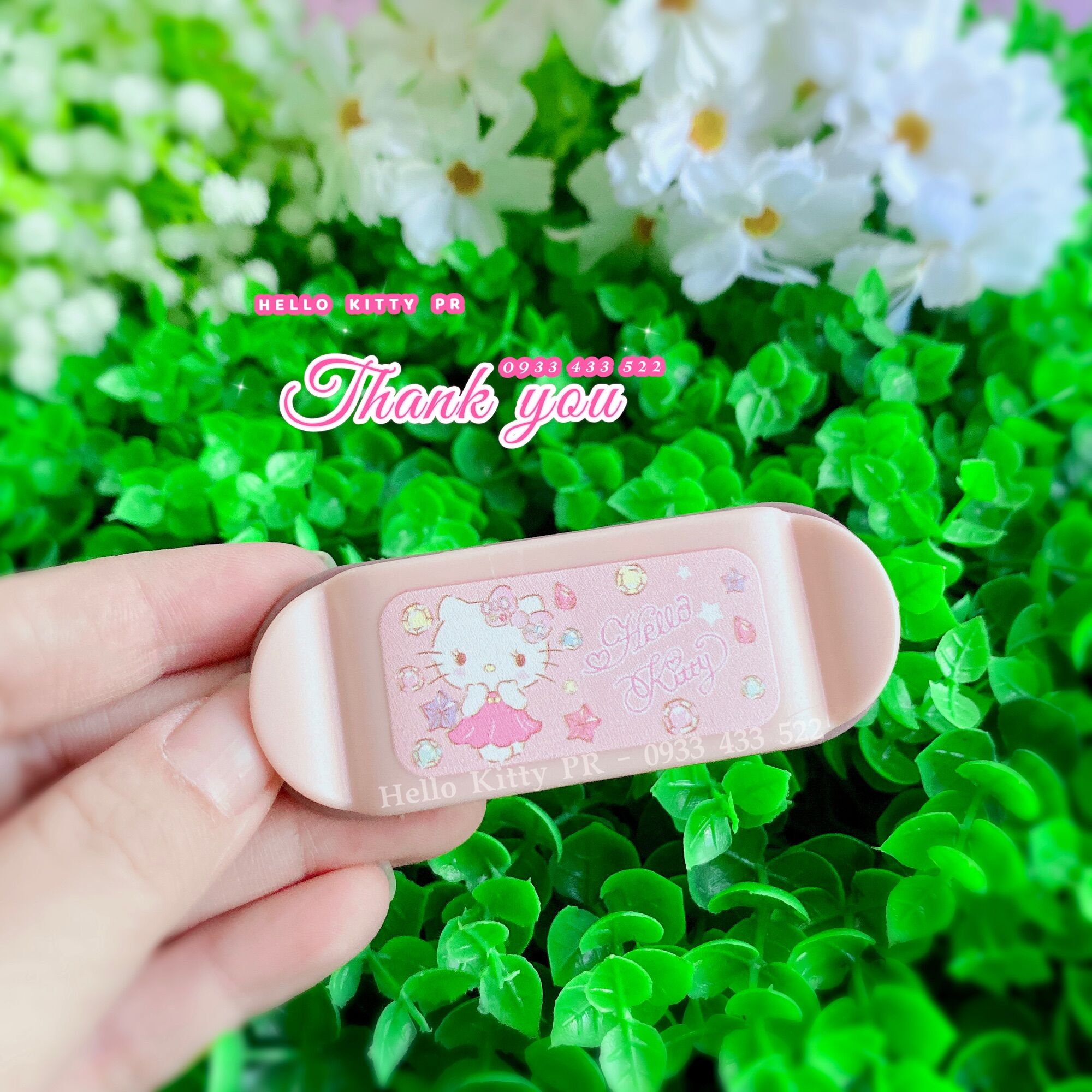 Kẹp giữ phích cắm Hello Kitty - Doremon Doraemon