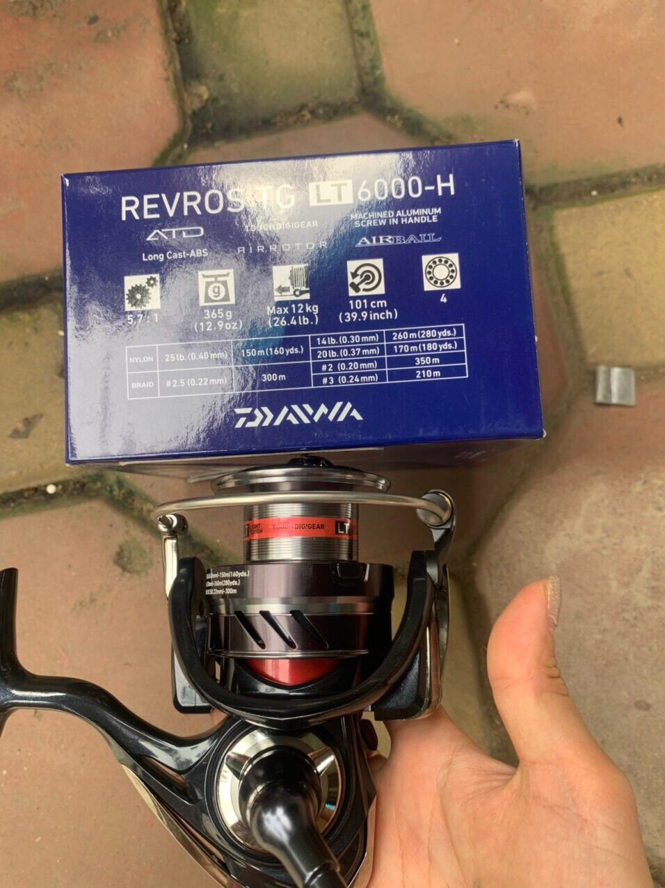 Máy câu Daiwa Revros TG