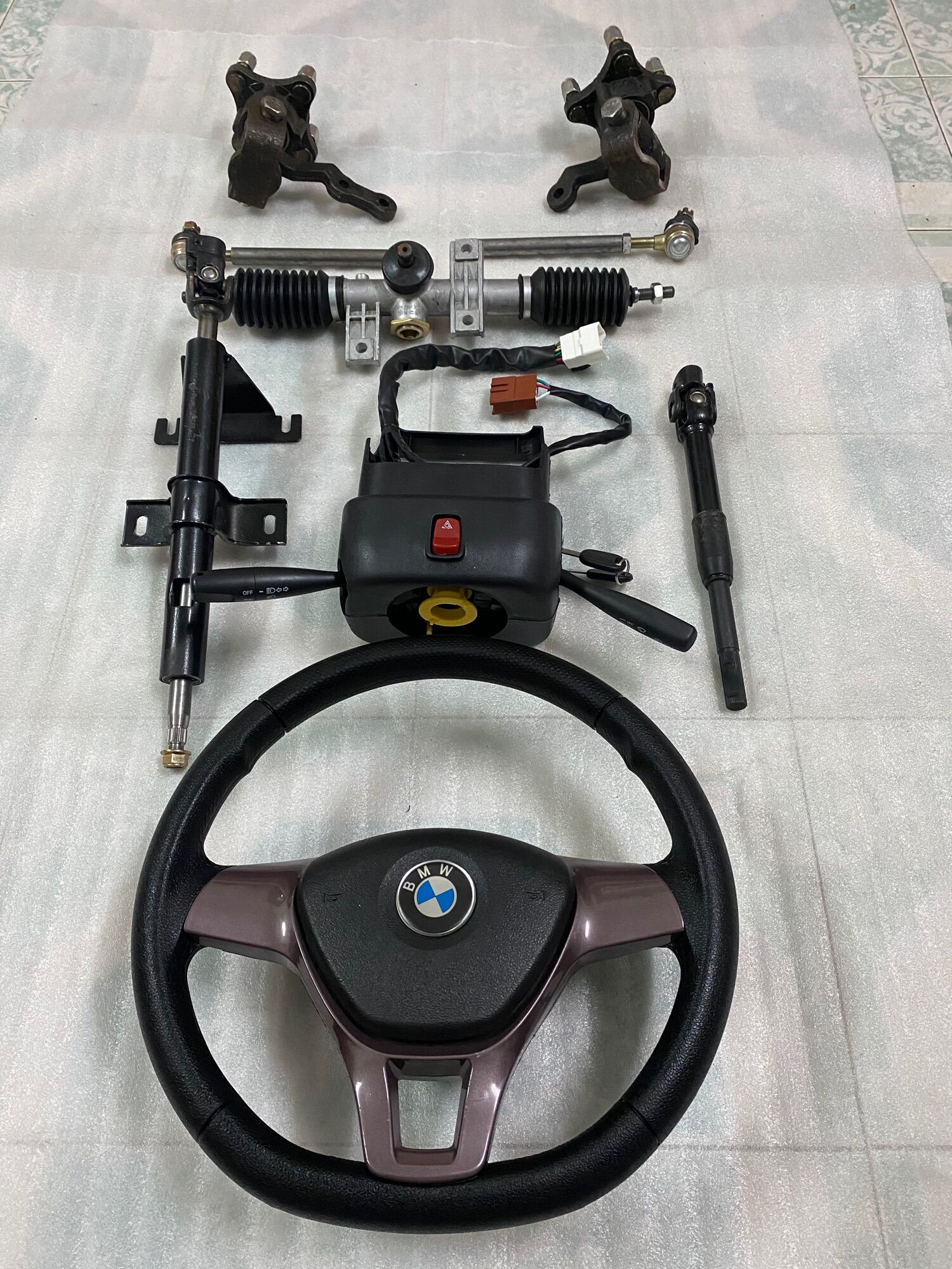Bộ Hệ thống lái vô lăng xe 4 bánh đầy đủ,mai ơ tim ốc đo vuông 7cm,chéo 10cm,dùng chế xe 4 bánh dễ sử dụng và lắp ráp