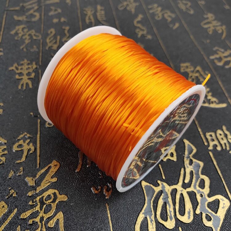 Cuộn cước lụa, cước thun tơ co giãn làm vòng size 0.4mm cuộn dầy 60m