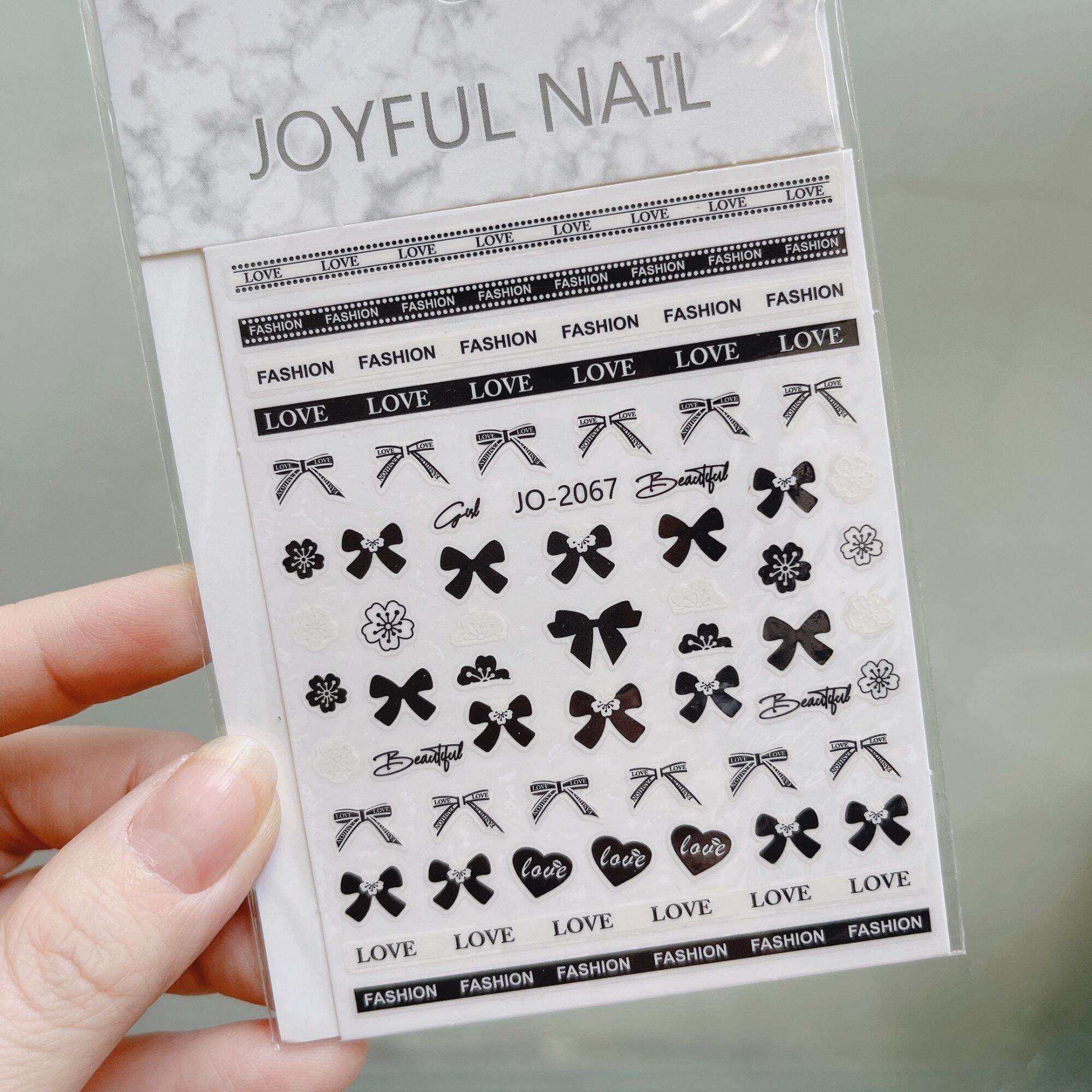 Sticker dán móng trang trí nail mẫu bướm nơ hoa