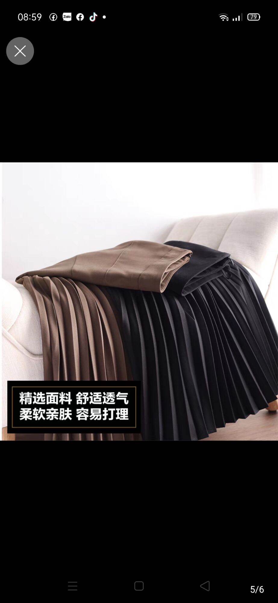Chân váy xếp ly dáng dài, xếp ly một bên