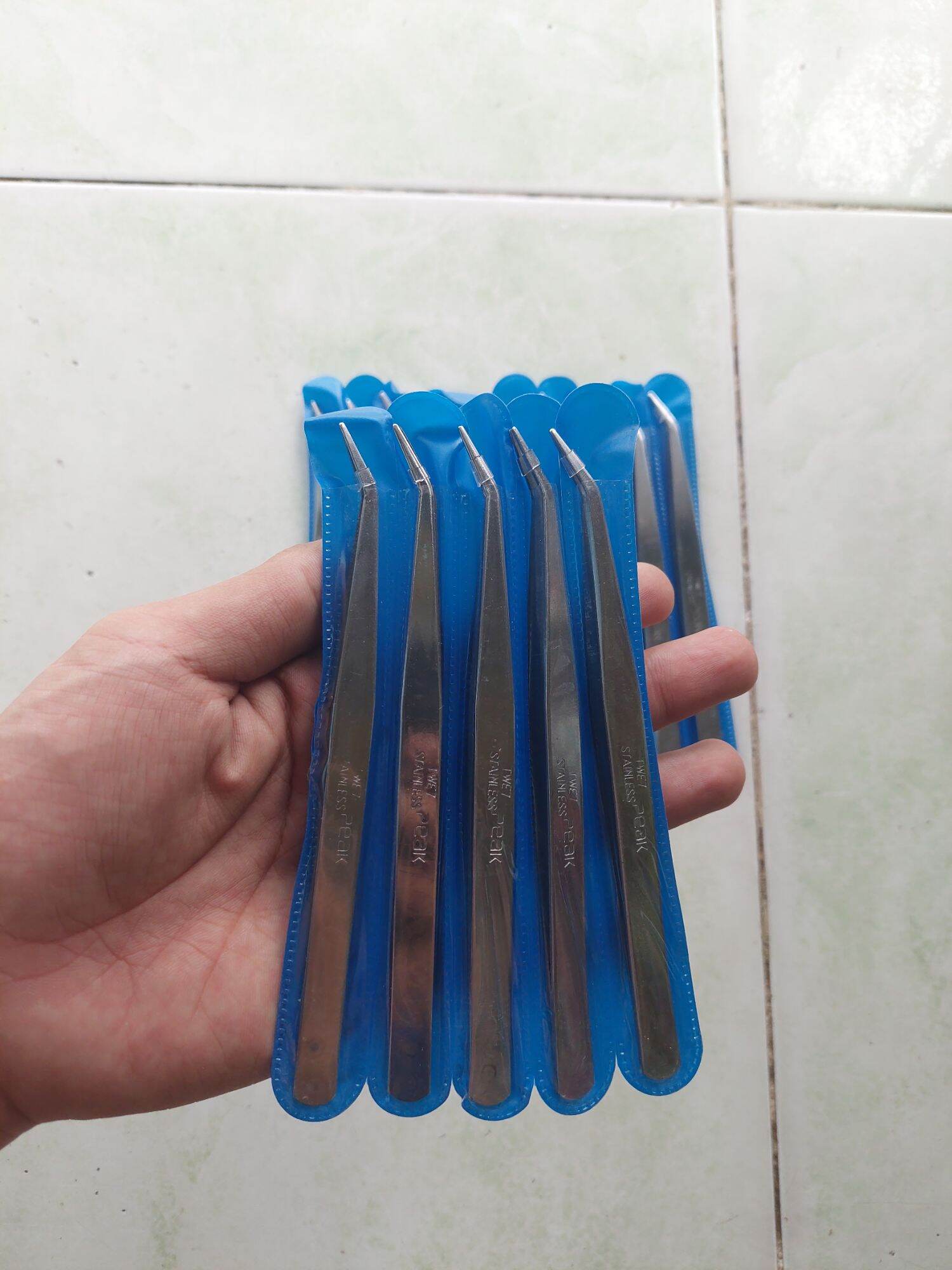 nhíp cong gắp chỉ cao cấp