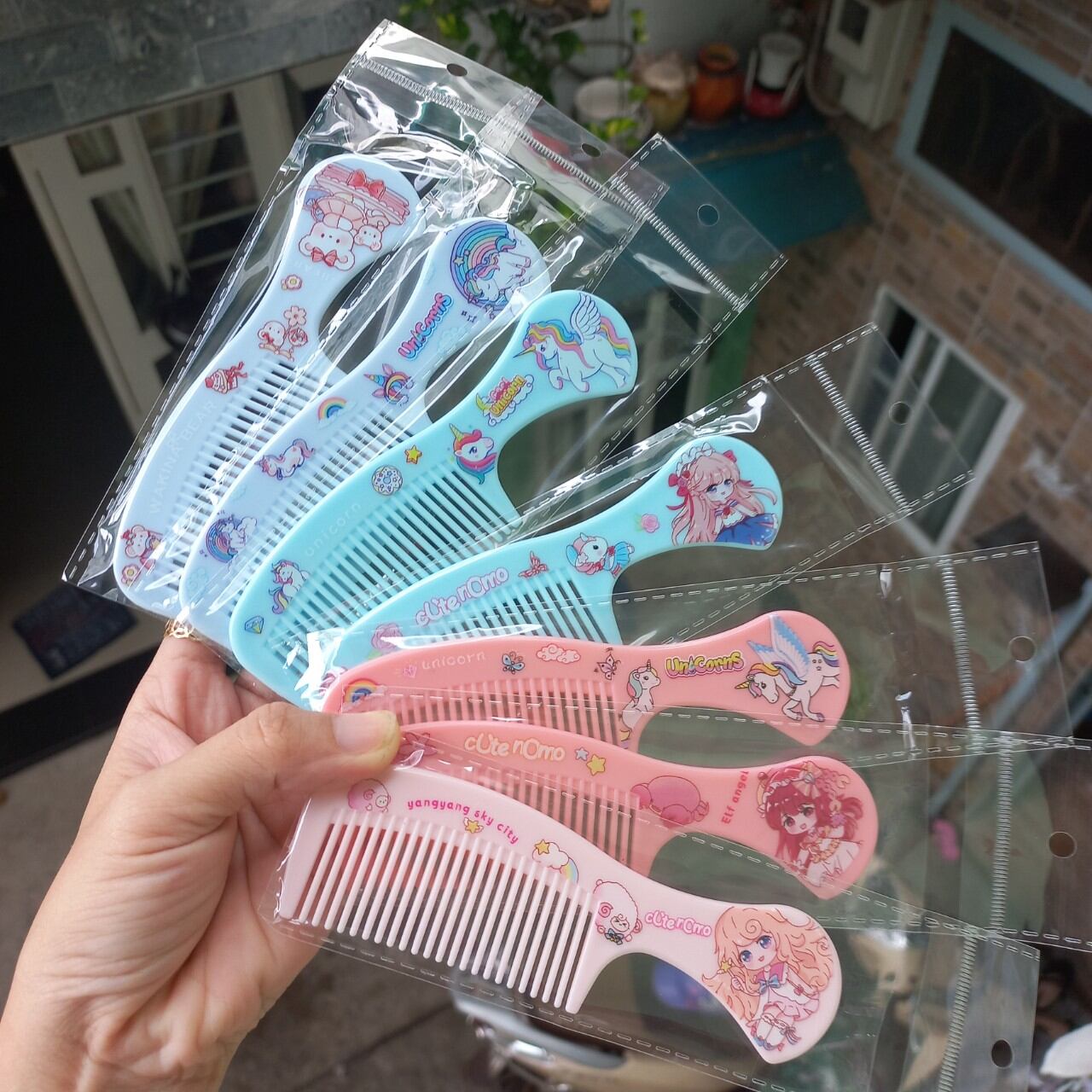 Lược chải tóc mini bỏ bóp hoạt hình