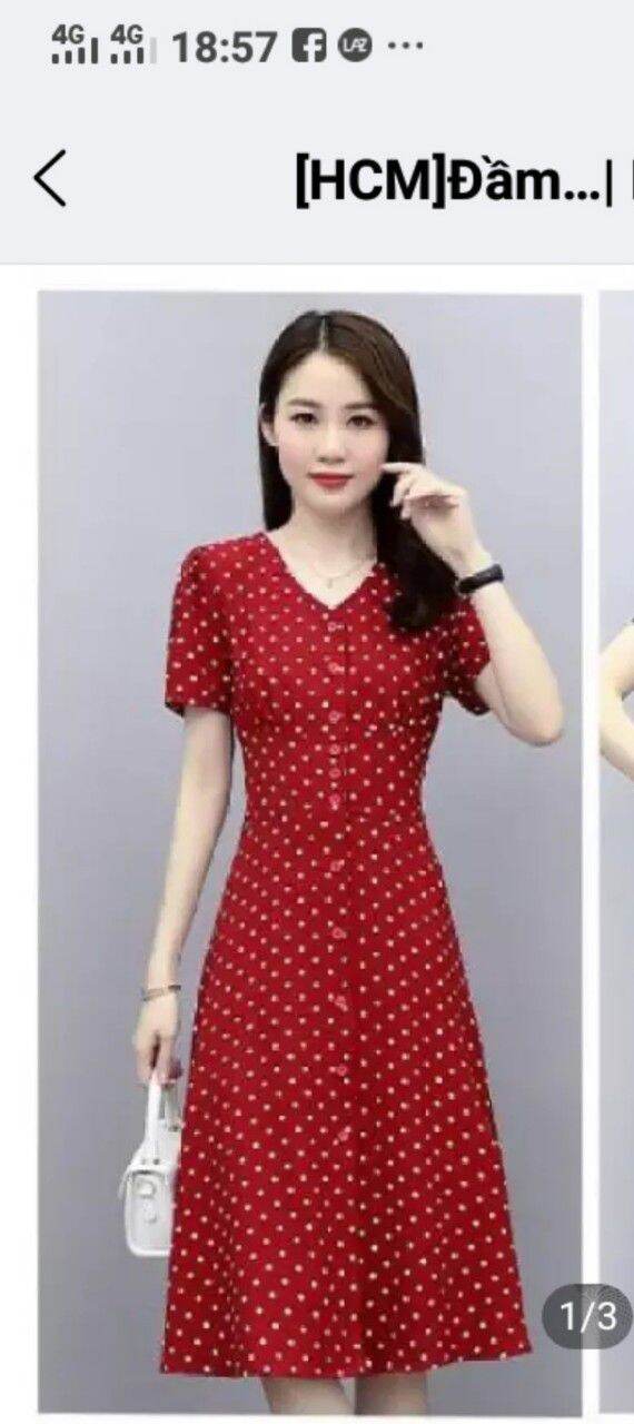 Đầm chấm bi cổ tim phối nút duyên dáng .Có size từ 38 đến 89 kg