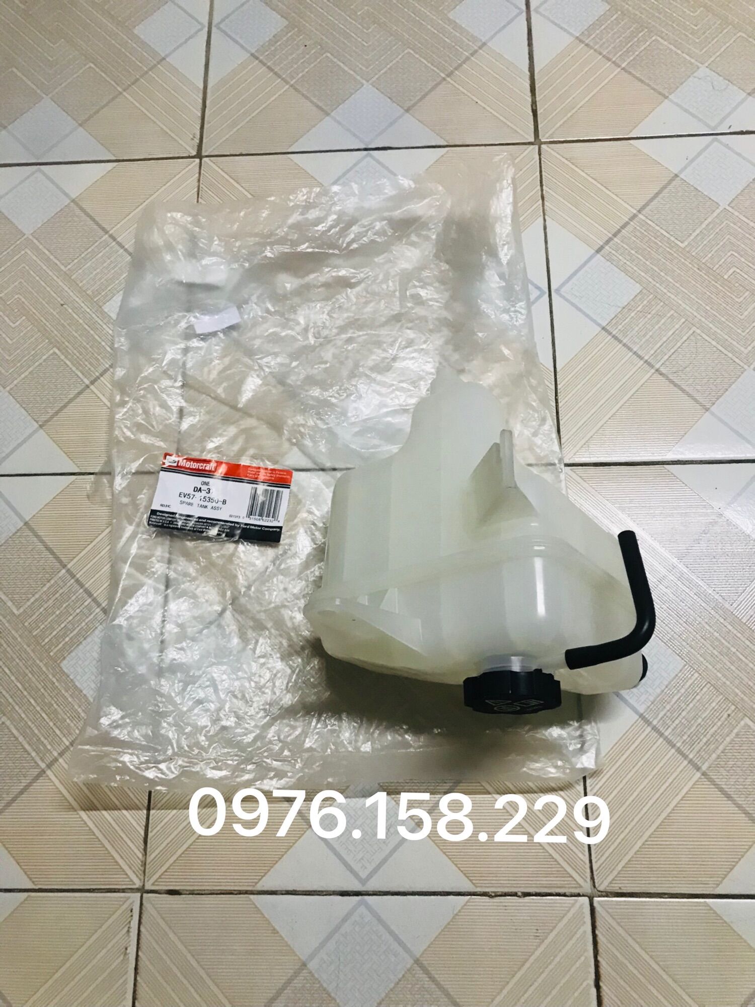 BÌNH NƯỚC PHỤ FORD ESCAPE
