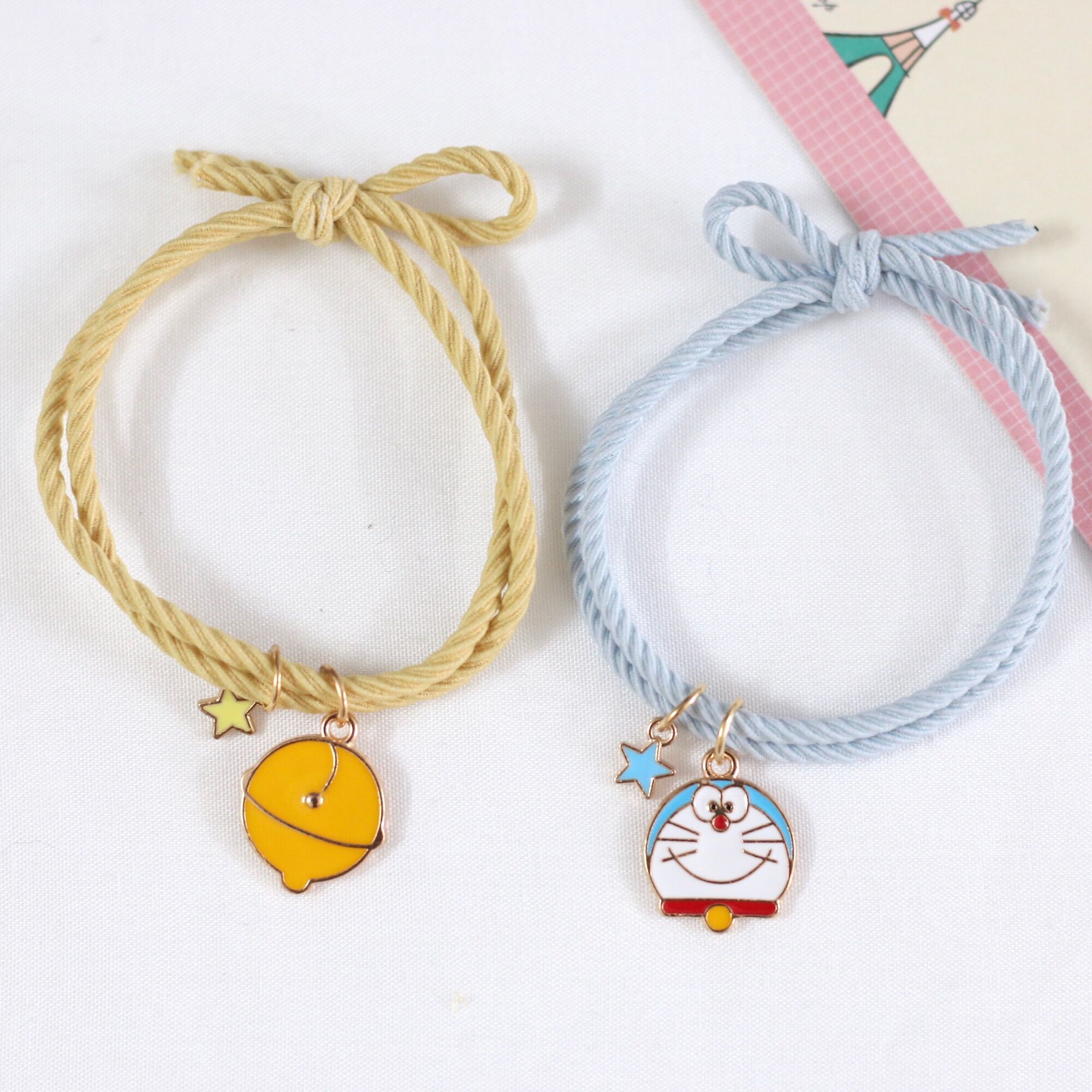 Combo 2 Dây Thun Buộc Tóc Mon + Chuông/Vòng Tay Doremon Doraemon