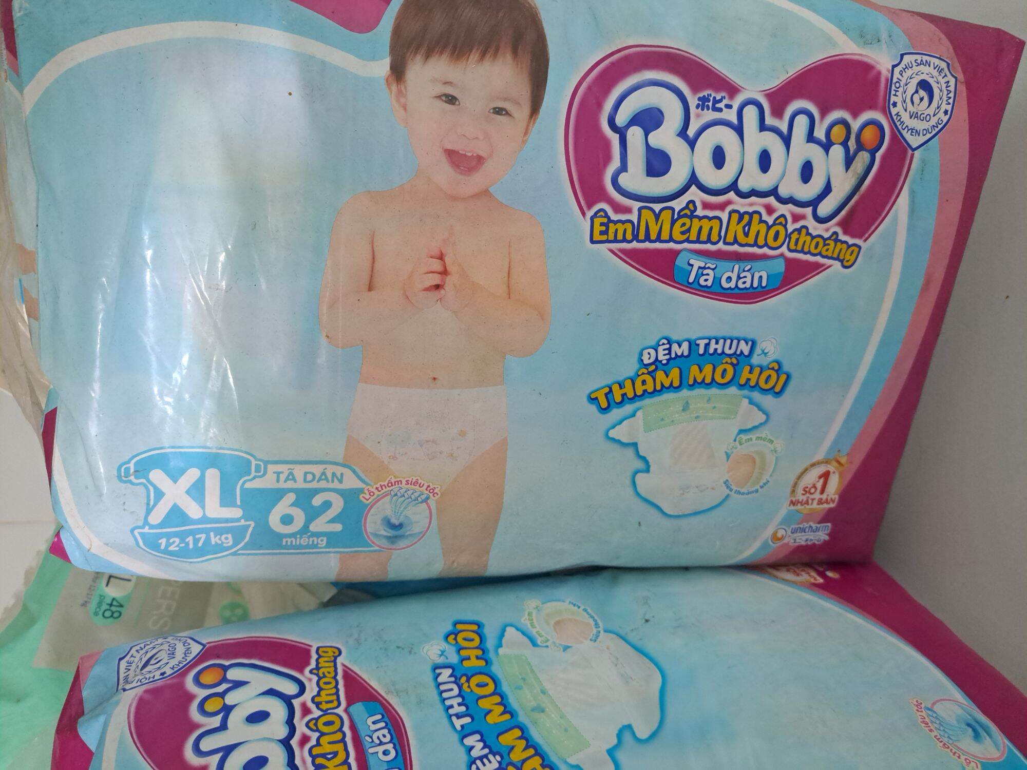 Xả miếng lót nb2 60, tã dán bobby l68, xl62 hàng bao bì dính bụi
