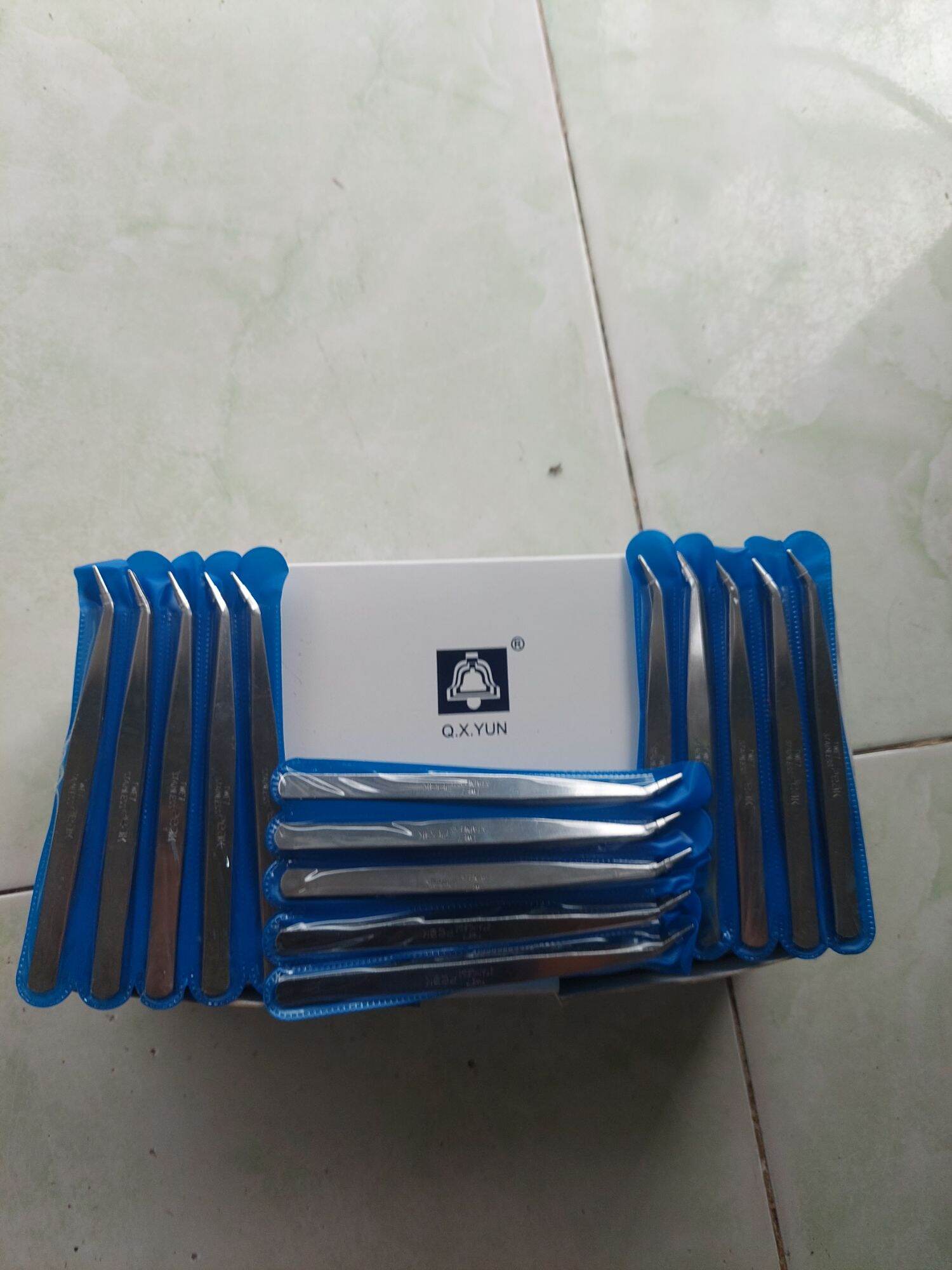 cây nhíp cong gắp chỉ vắt sổ