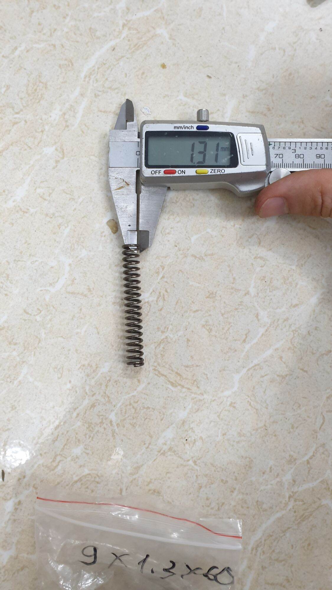 Lò xo phi 9 sợi 1.3 dài 6cm