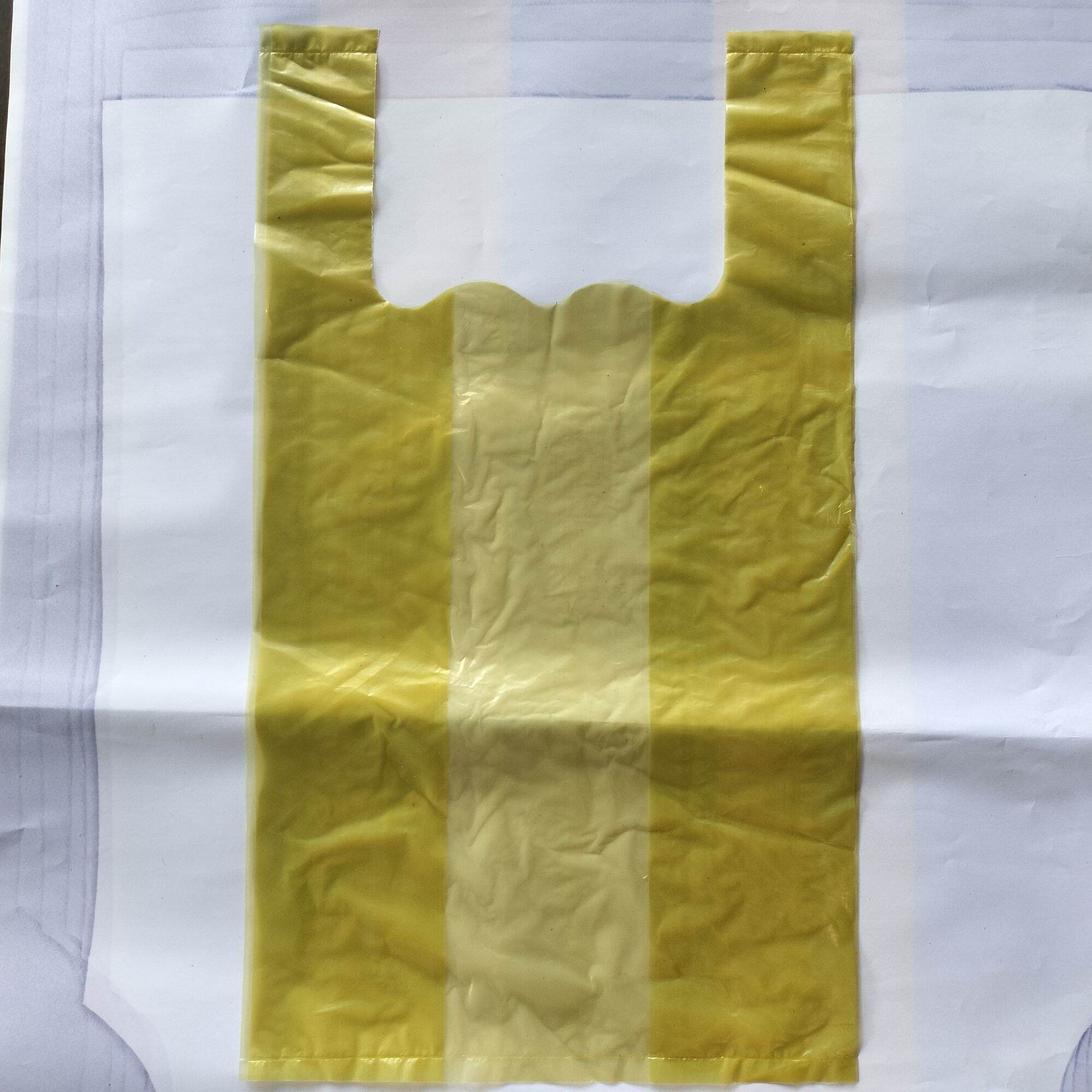 Túi xốp nilon màu mỡ có quai (1kg)