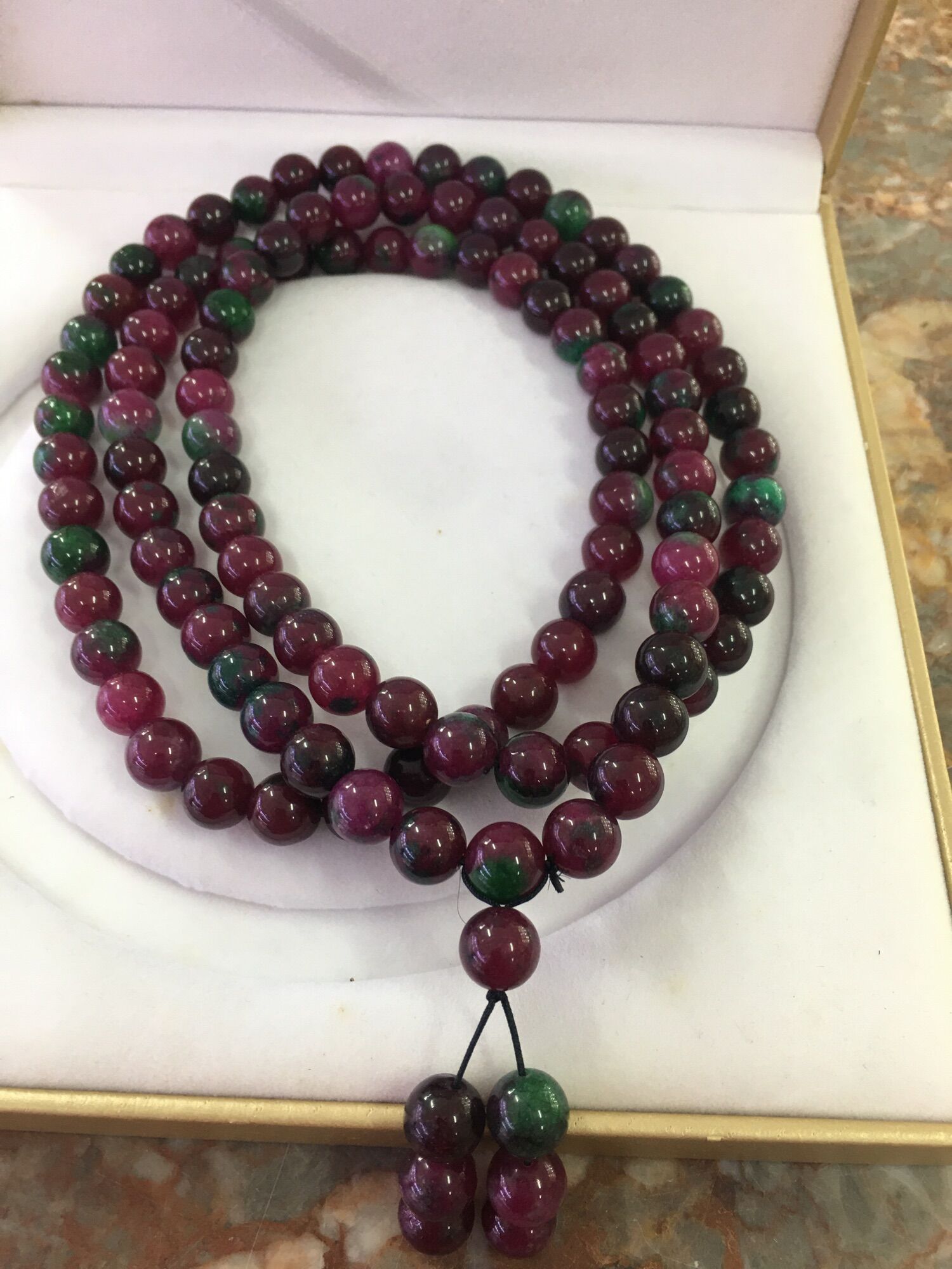 Chuỗi 108 hạt đá ruby phi hạt 10li rất đẹp .