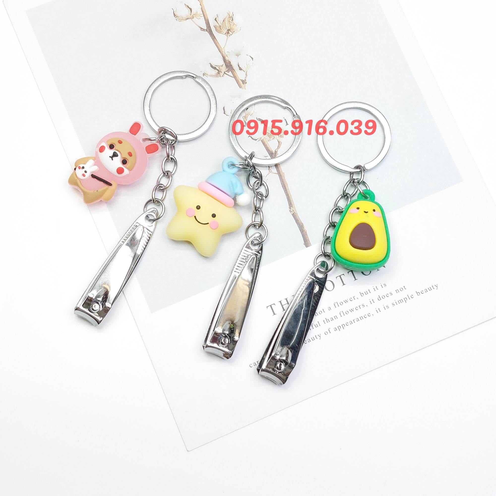 Bấm móng tay kèm móc khóa cao su dễ thương