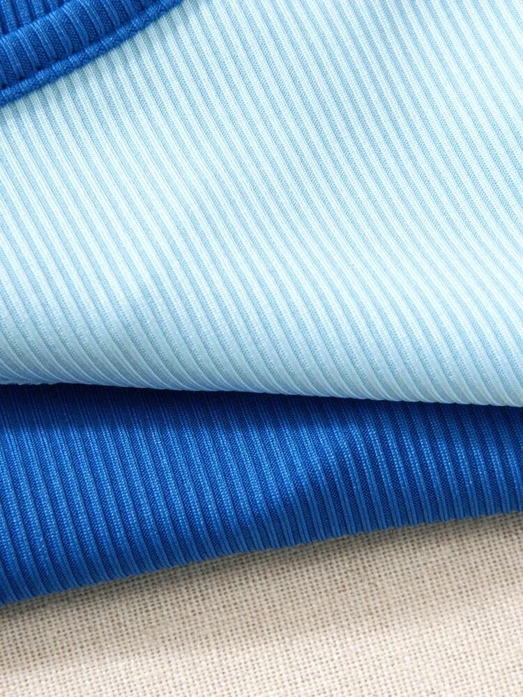 Áo croptop phối hai màu đan chéo (xanh coban + xanh ngọc)