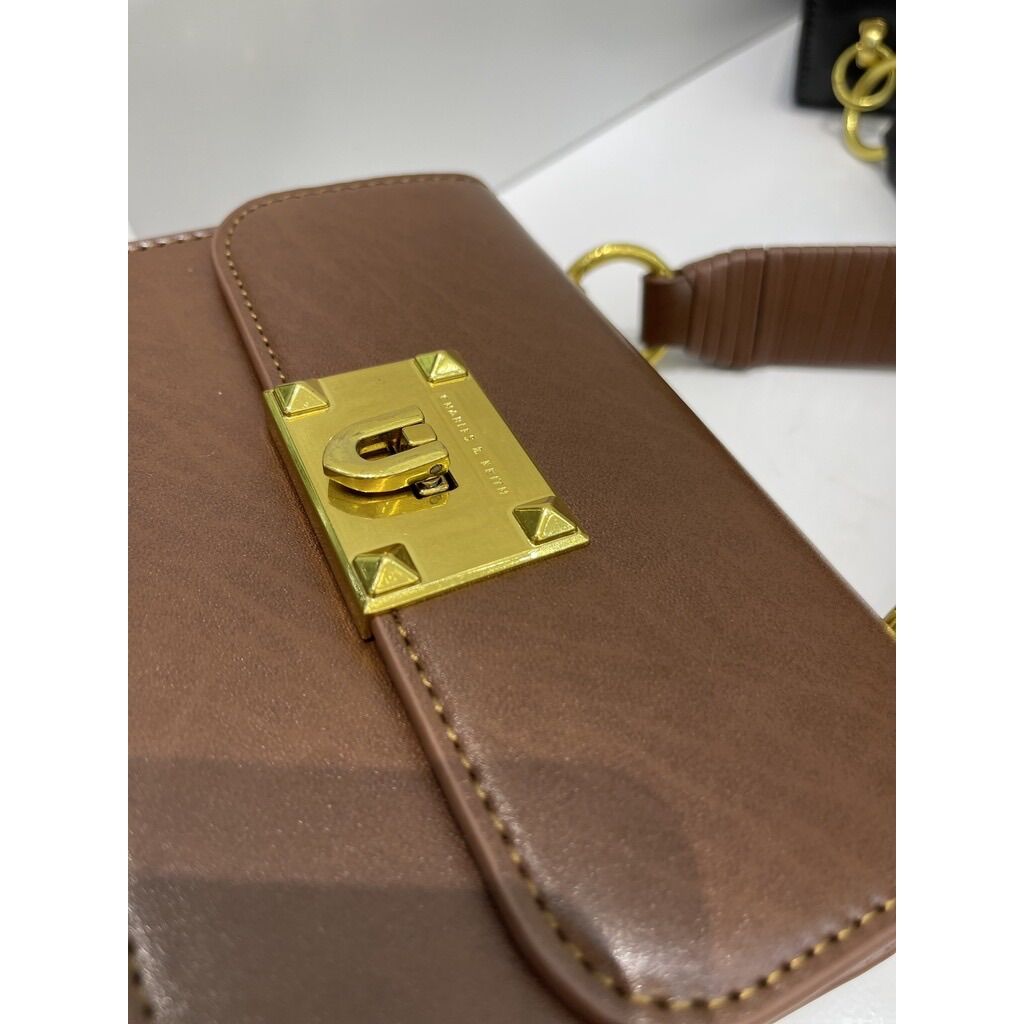 Túi C.K quai đan size 17 khoá gập xuất dư