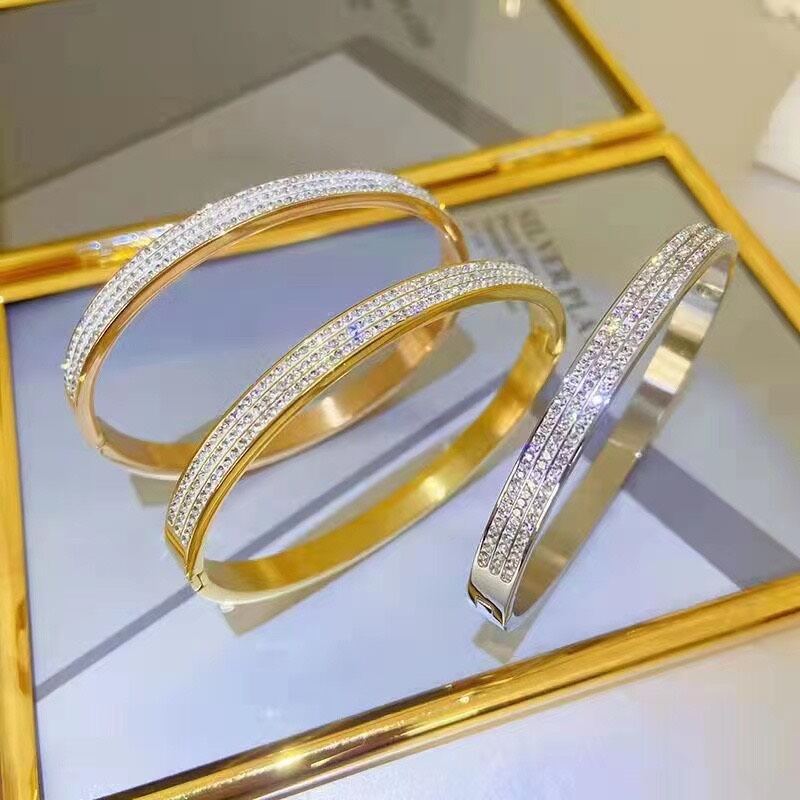 Tt2484 - vòng tay titan viền 3 hàng đá trắng