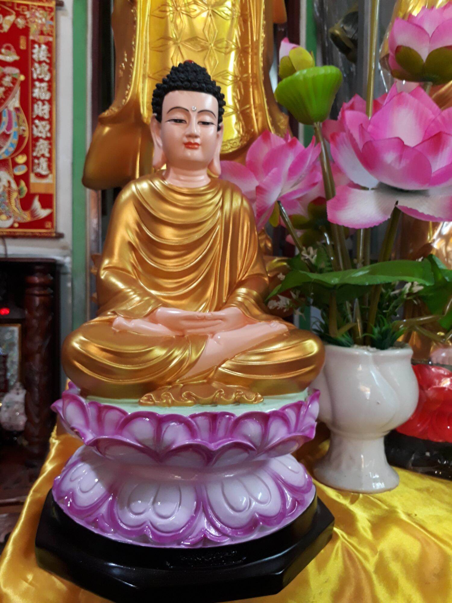 Tượng phật thích ca đắp y cao 4 tấc chất liệu polyme sen hồng