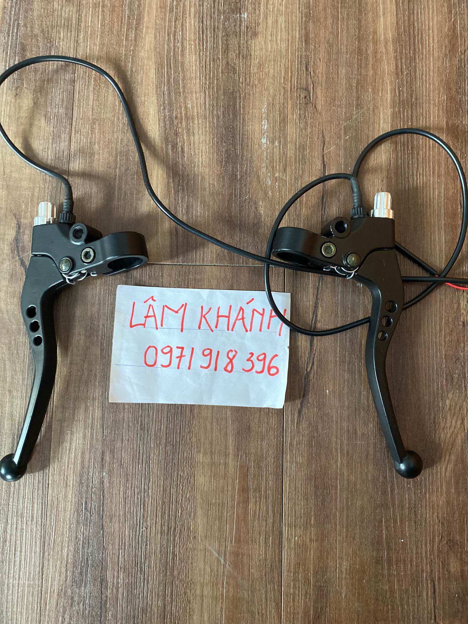 Bộ tay phanh trái phải xe điện 133, tay phanh lỗ xe điện 133s 133m