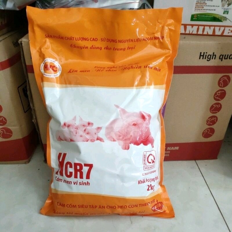 Cám viên tập ăn cho heo con theo mẹ, chó con, chó mẹ nuôi con, cám sữa có men vi sinh phòng tiêu chảy túi 2kg