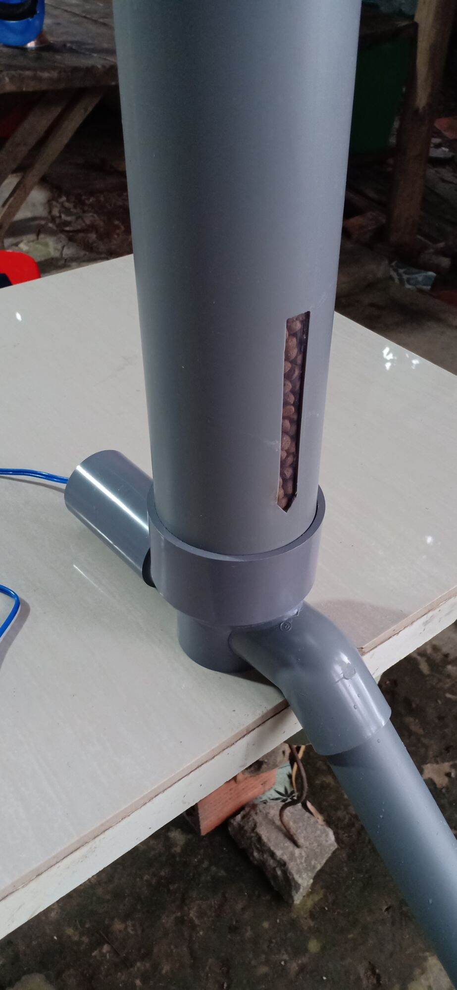 Máy Cho Cá Gà ăn tự động V7-T2 ( An TCS )