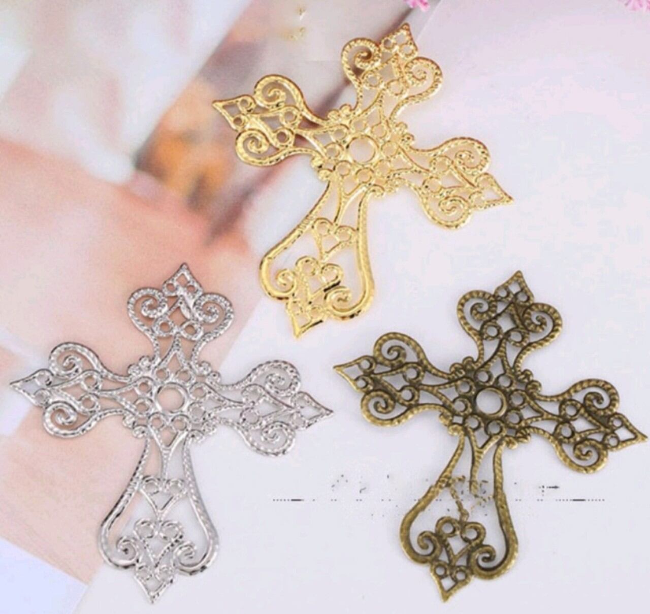Miếng kim loại hình giá chữ thập mã 1