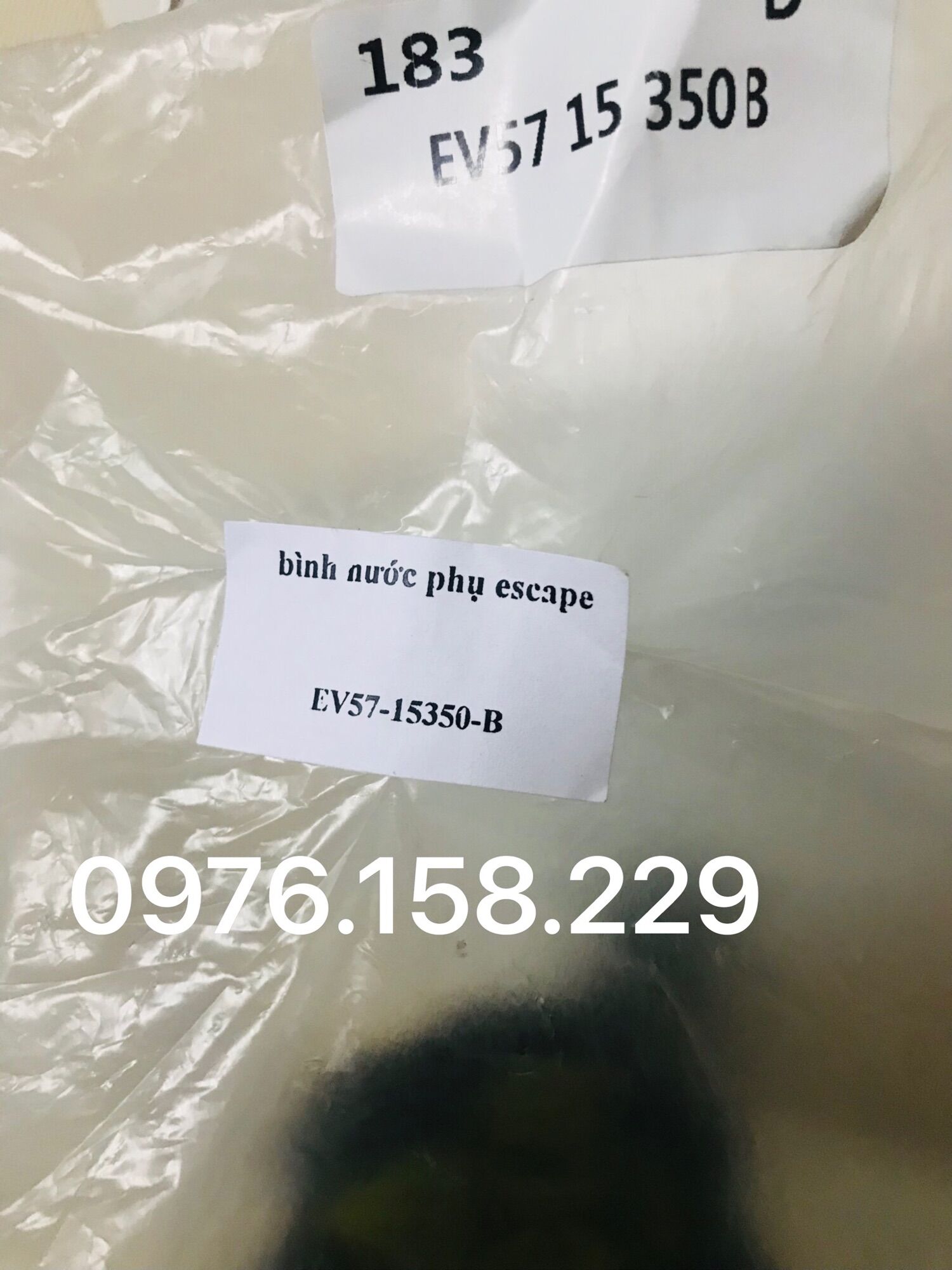 BÌNH NƯỚC PHỤ FORD ESCAPE