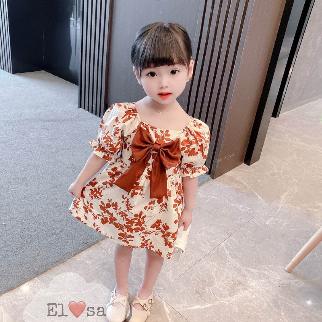 Đầm nơ trước cho bé