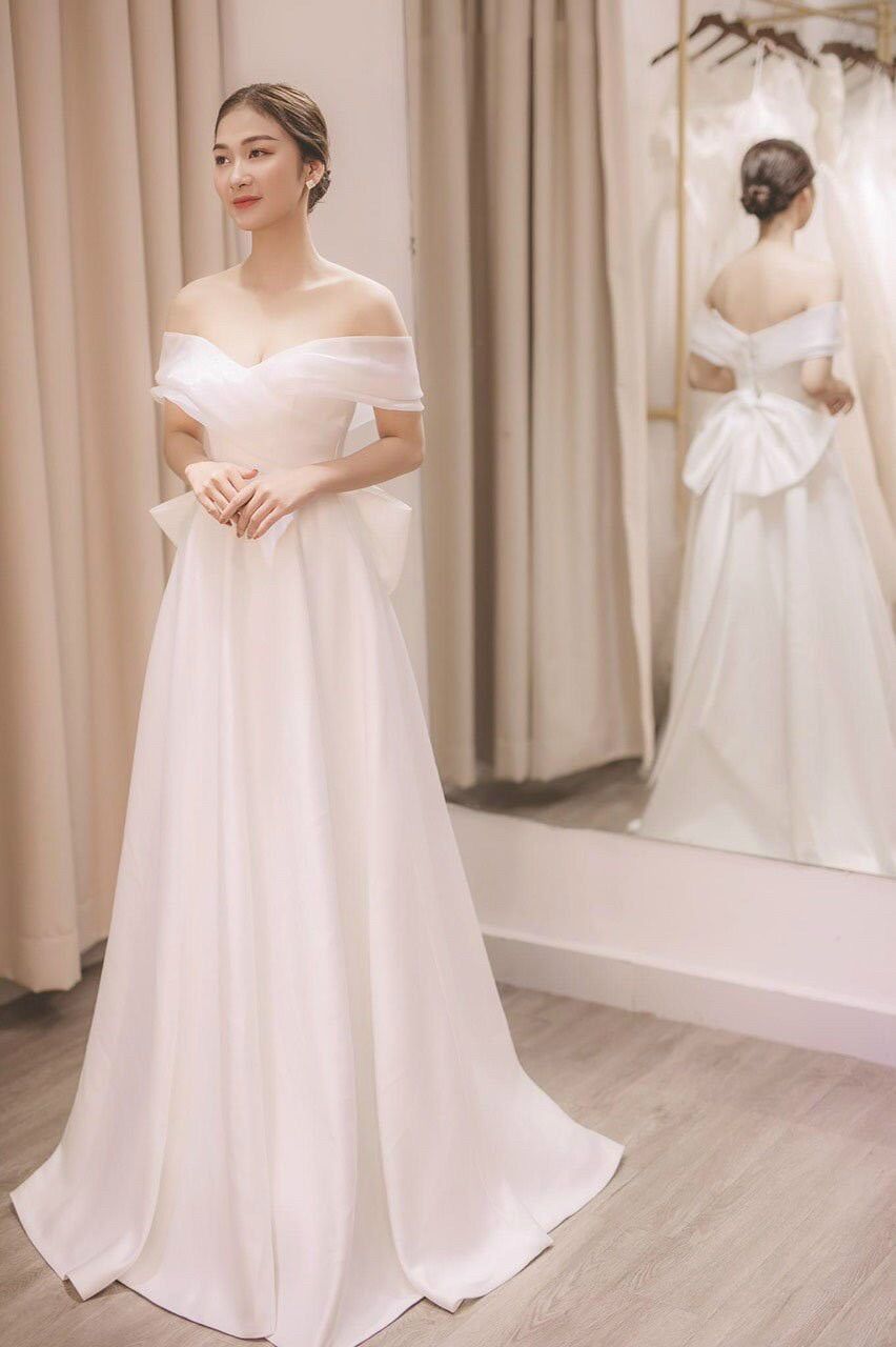 Đầm maxi xoè bẹt vai kết nơ